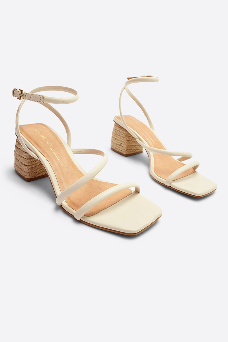 "INTENTIONALLY __________." Limo Heeled Sandal