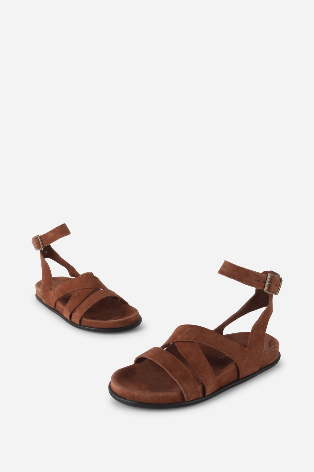 "INTENTIONALLY __________." Myko Ankle Strap Flat Sandal
