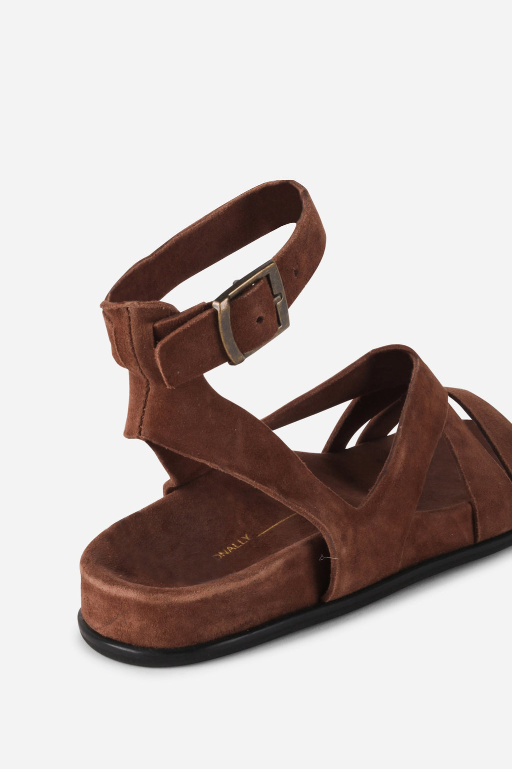 "INTENTIONALLY __________." Myko Ankle Strap Flat Sandal
