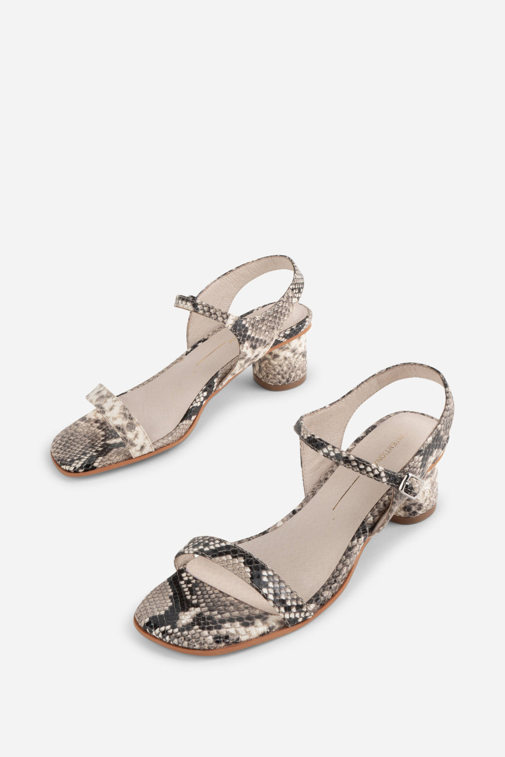 "INTENTIONALLY __________." Opinion Animal Print Heel - Black White