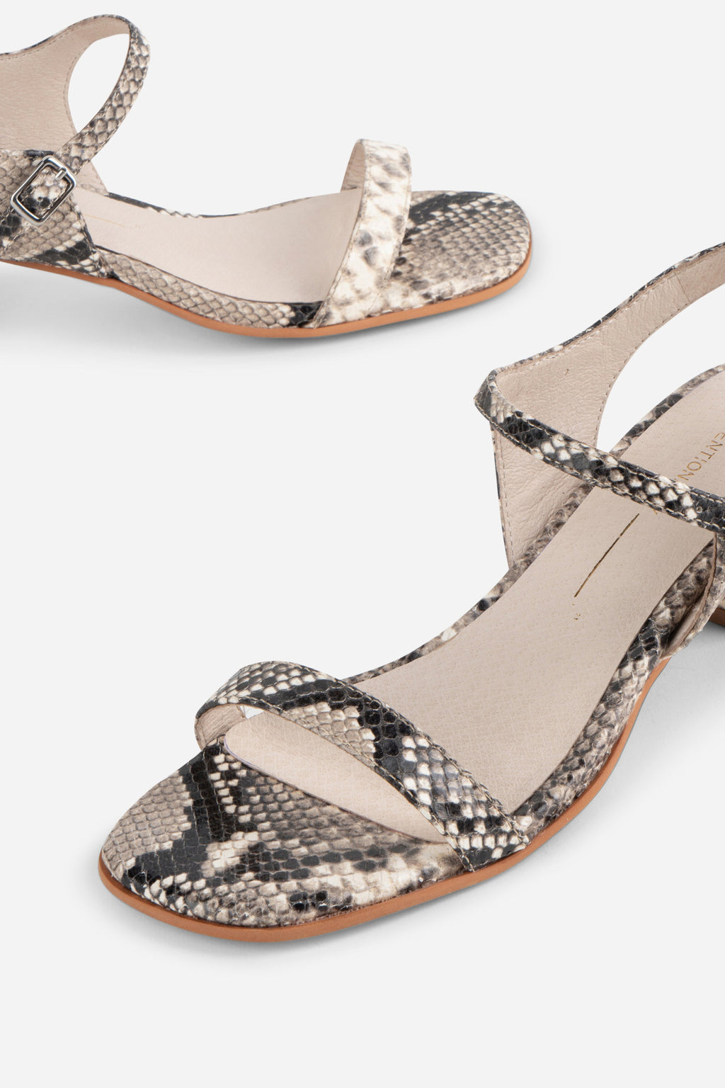"INTENTIONALLY __________." Opinion Animal Print Heel - Black White