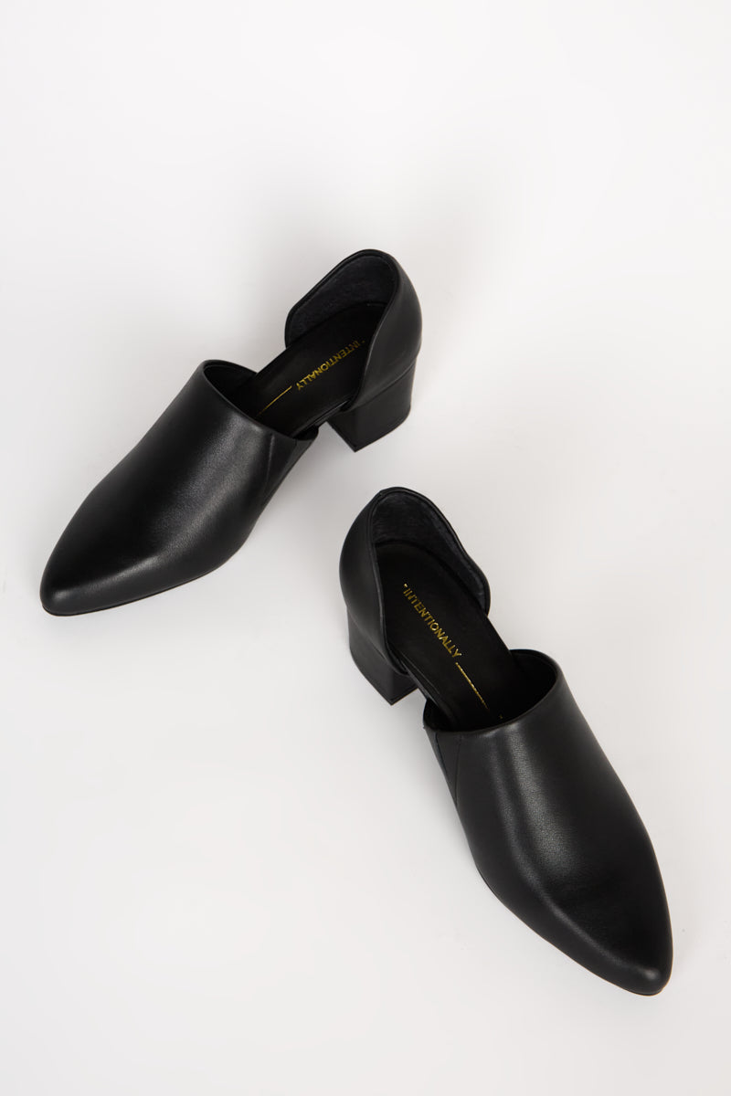 "INTENTIONALLY __________." Perf-Hi Heel - Black