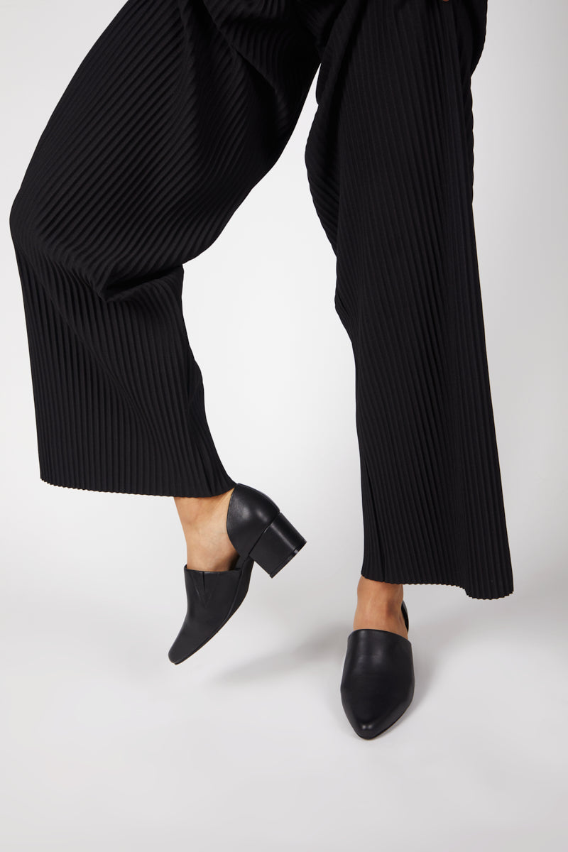 "INTENTIONALLY __________." Perf-Hi Heel - Black