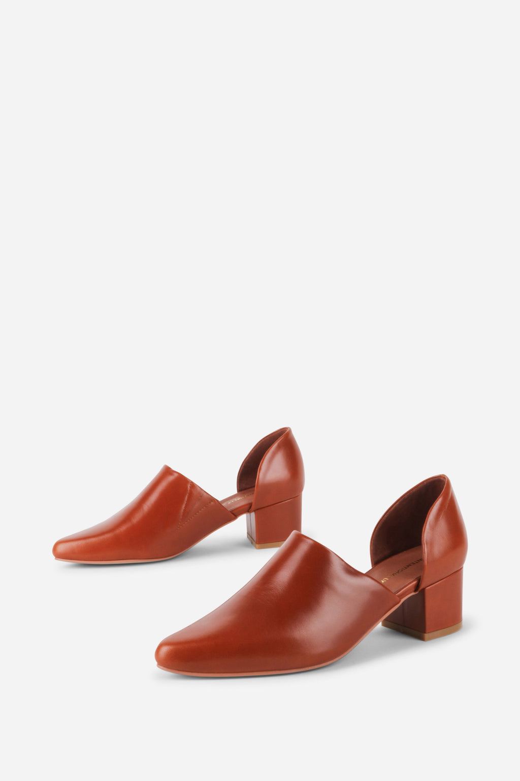 "INTENTIONALLY __________." Perf-Hi Heel - Black