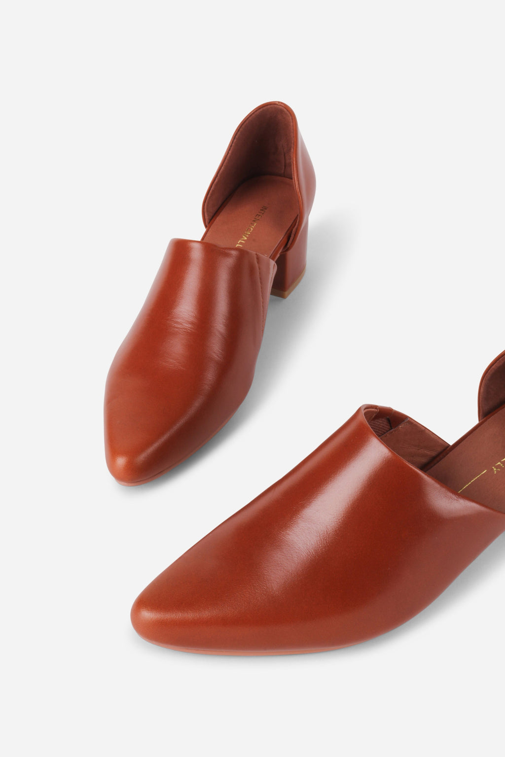 "INTENTIONALLY __________." Perf-Hi Heel - Black