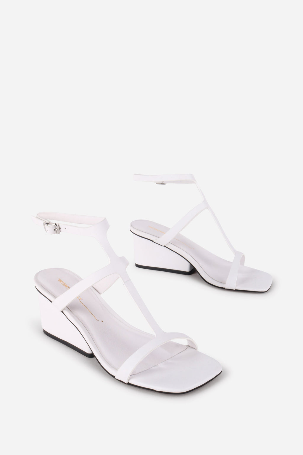 "INTENTIONALLY __________." Semy Wedge Heel Sandal