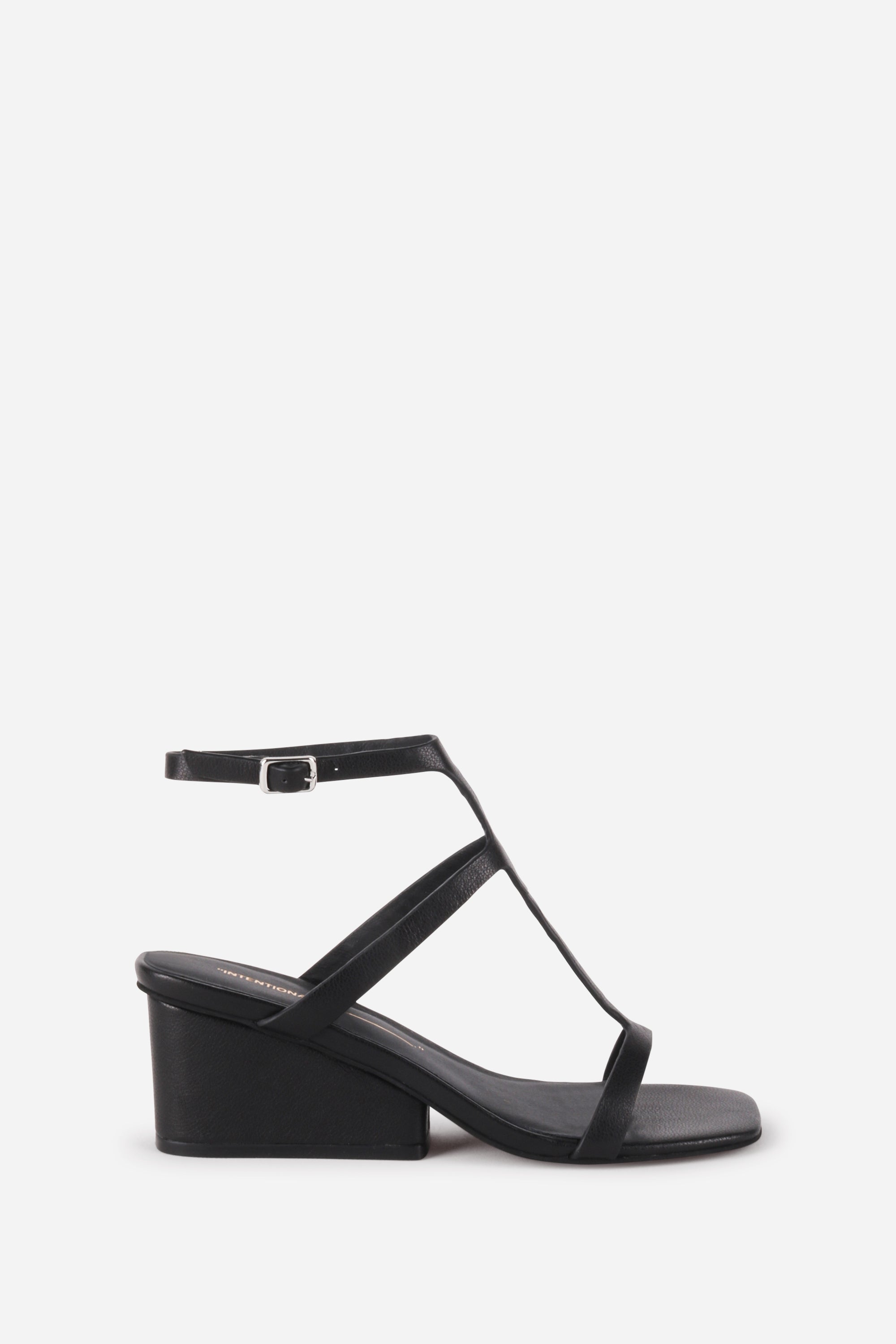 "INTENTIONALLY __________." Semy Wedge Heel Sandal