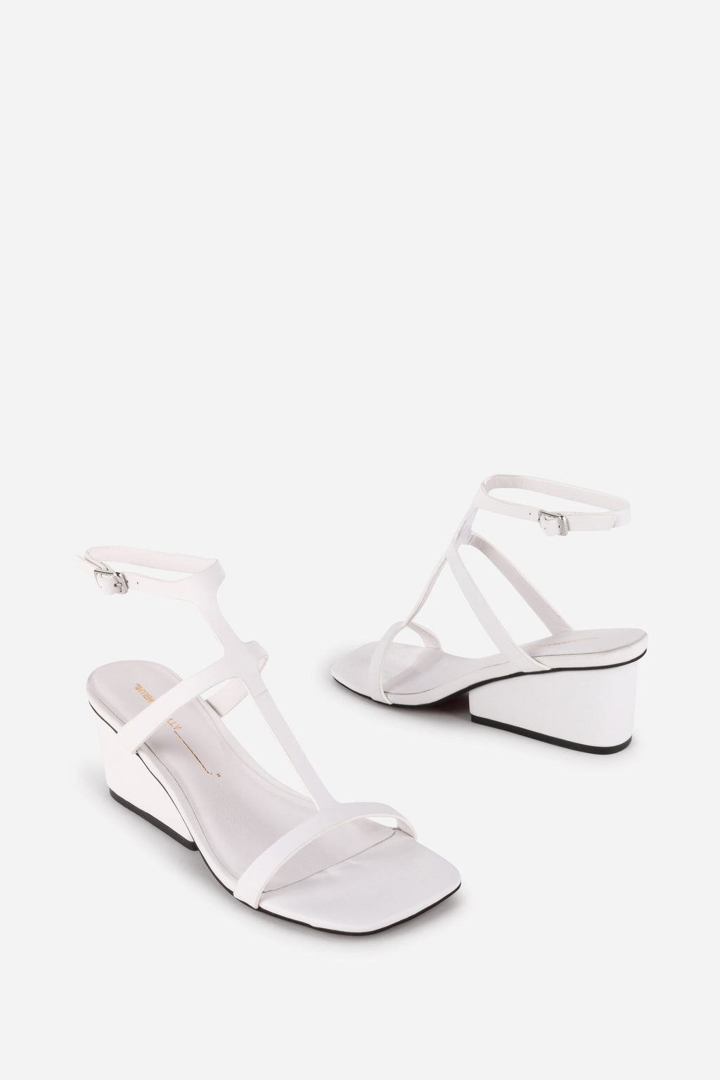 "INTENTIONALLY __________." Semy Wedge Heel Sandal