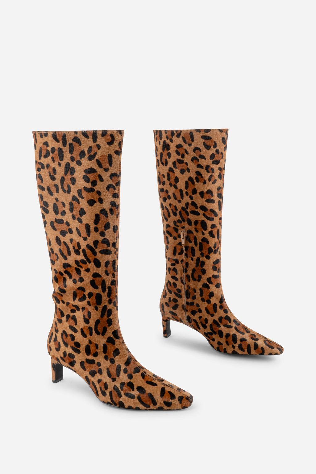 "INTENTIONALLY __________." Seville Knee High Boot - Cheetah