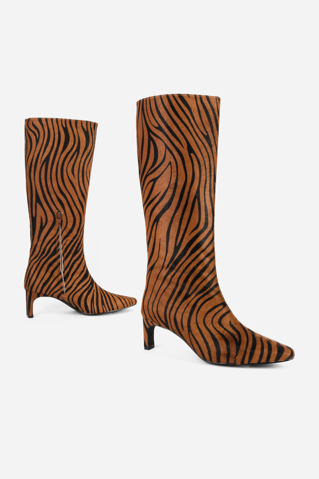 "INTENTIONALLY __________." Seville Knee High Boot - Cheetah