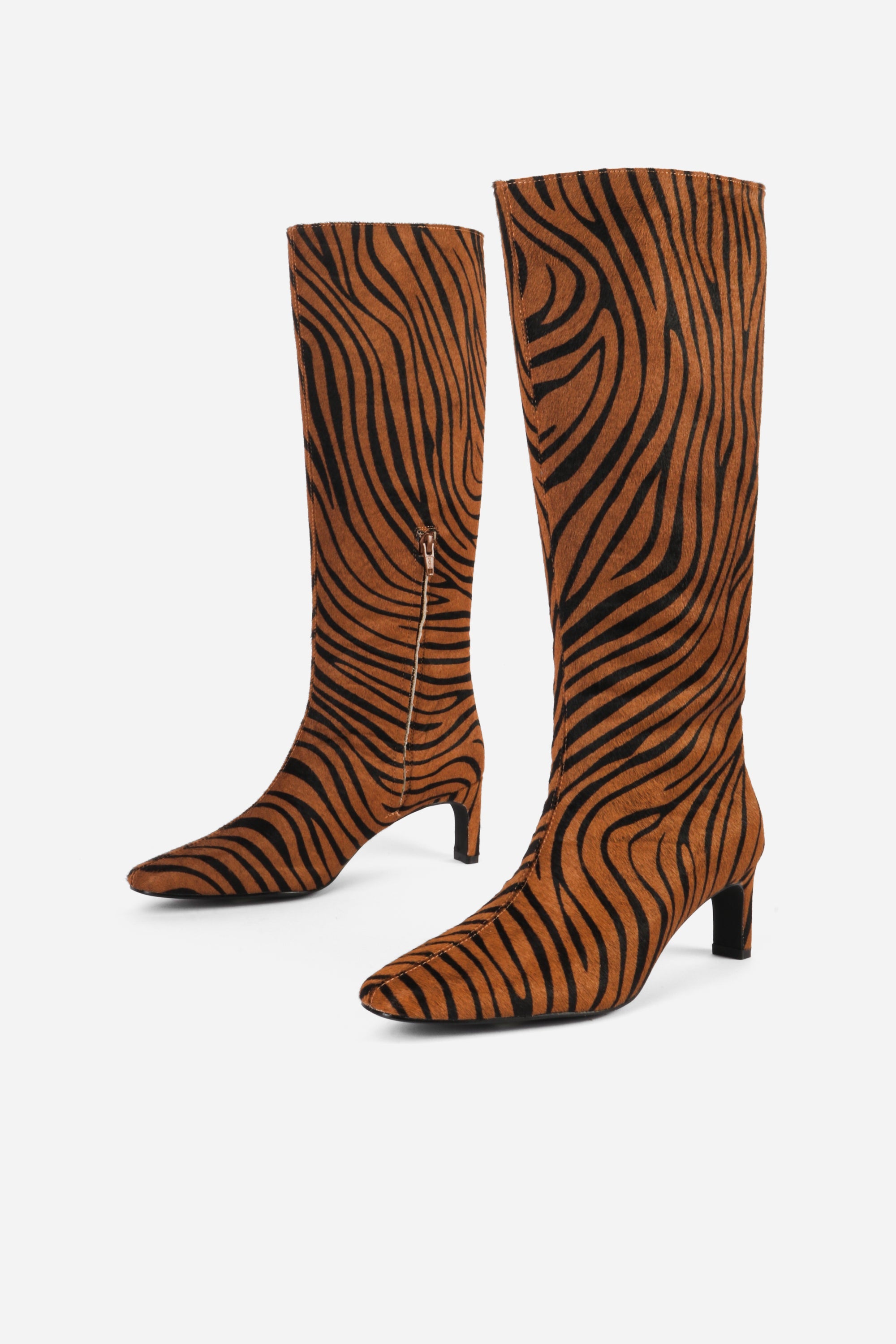 "INTENTIONALLY __________." Seville Knee High Boot - Cheetah