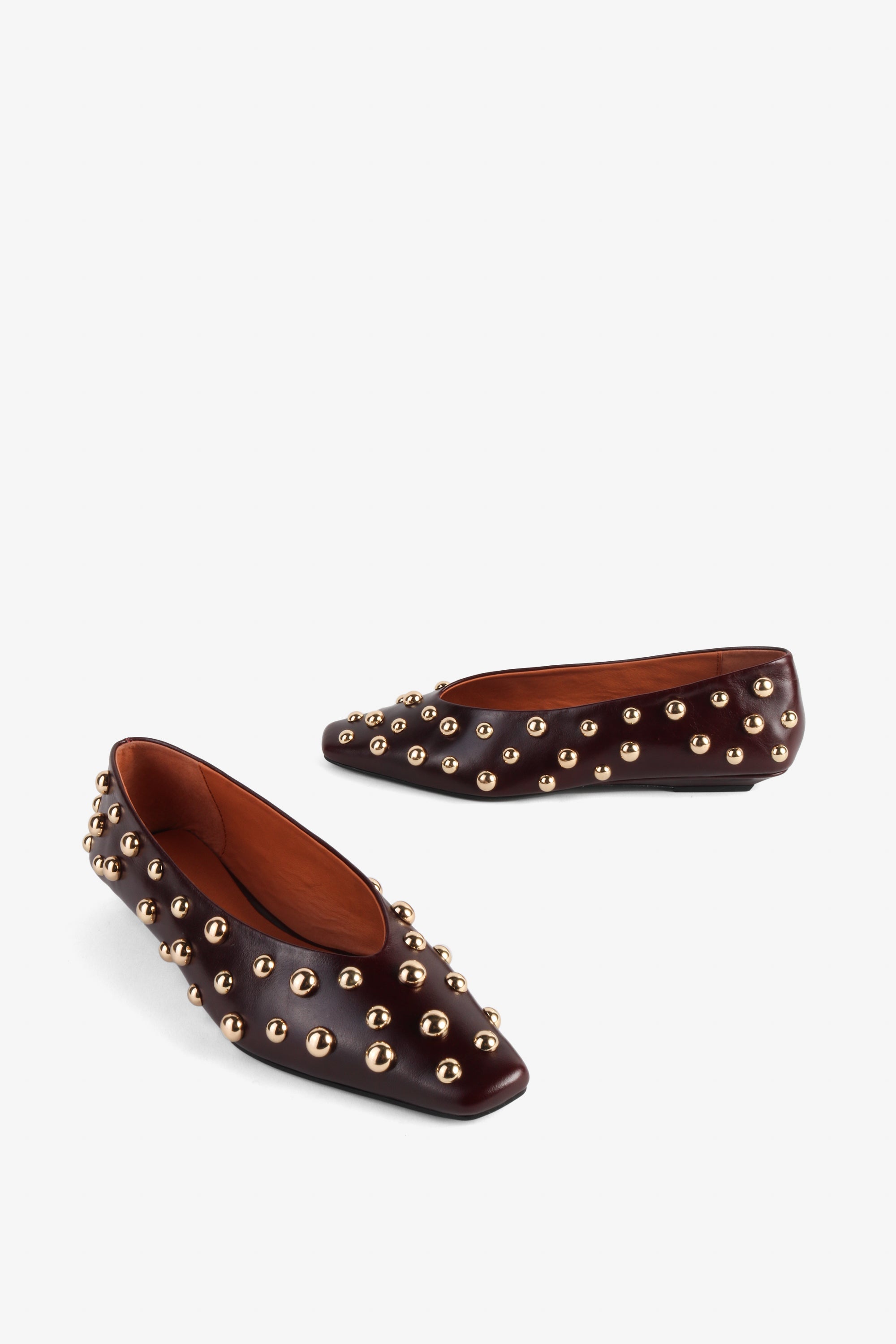 "INTENTIONALLY __________." Switch Dome Studded Flats