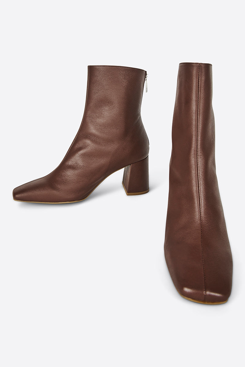 "INTENTIONALLY __________." TABATHA HEELED BOOT - Multi