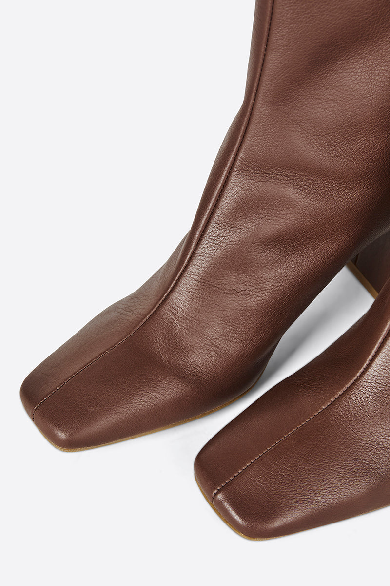 "INTENTIONALLY __________." TABATHA HEELED BOOT - Multi