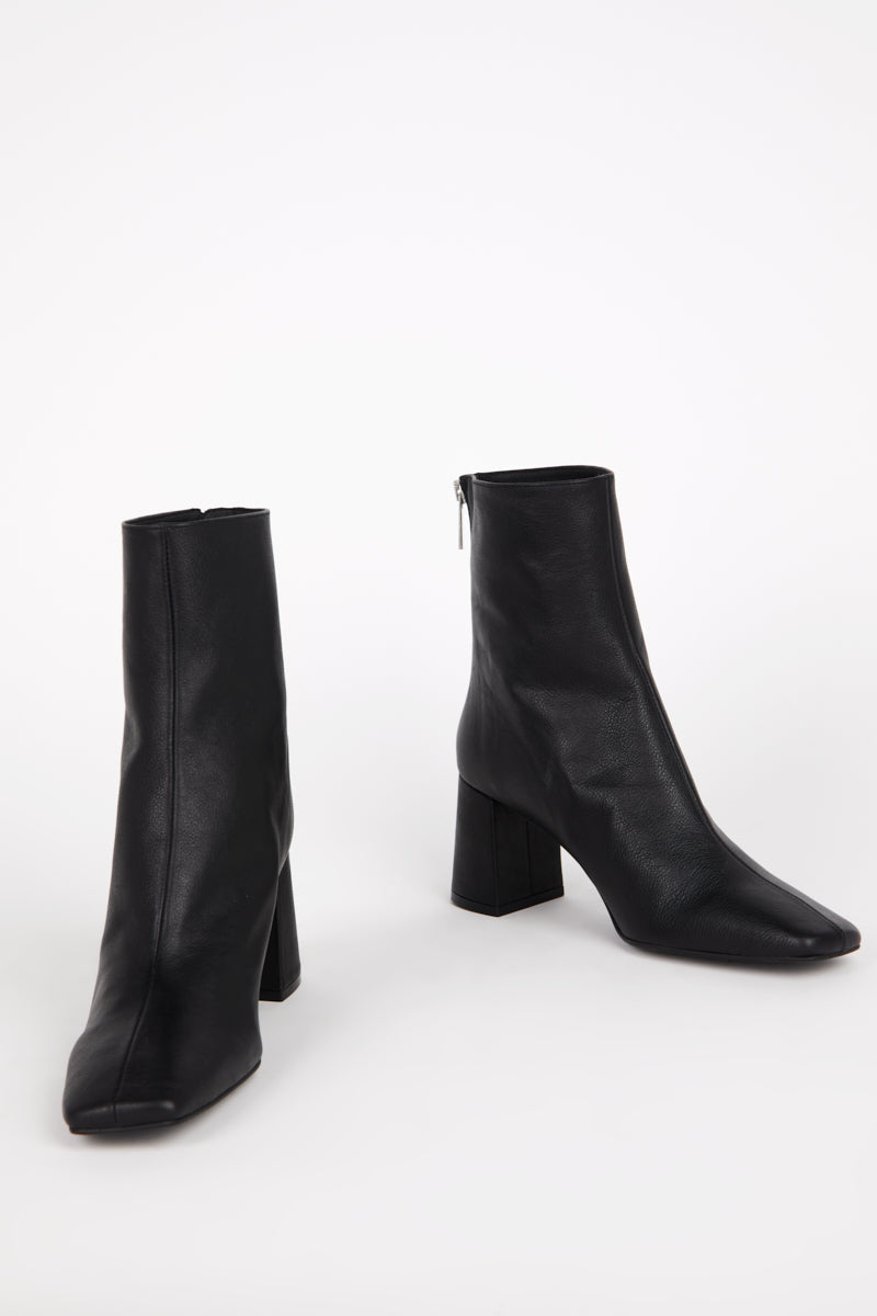 "INTENTIONALLY __________." TABATHA HEELED BOOT - Multi