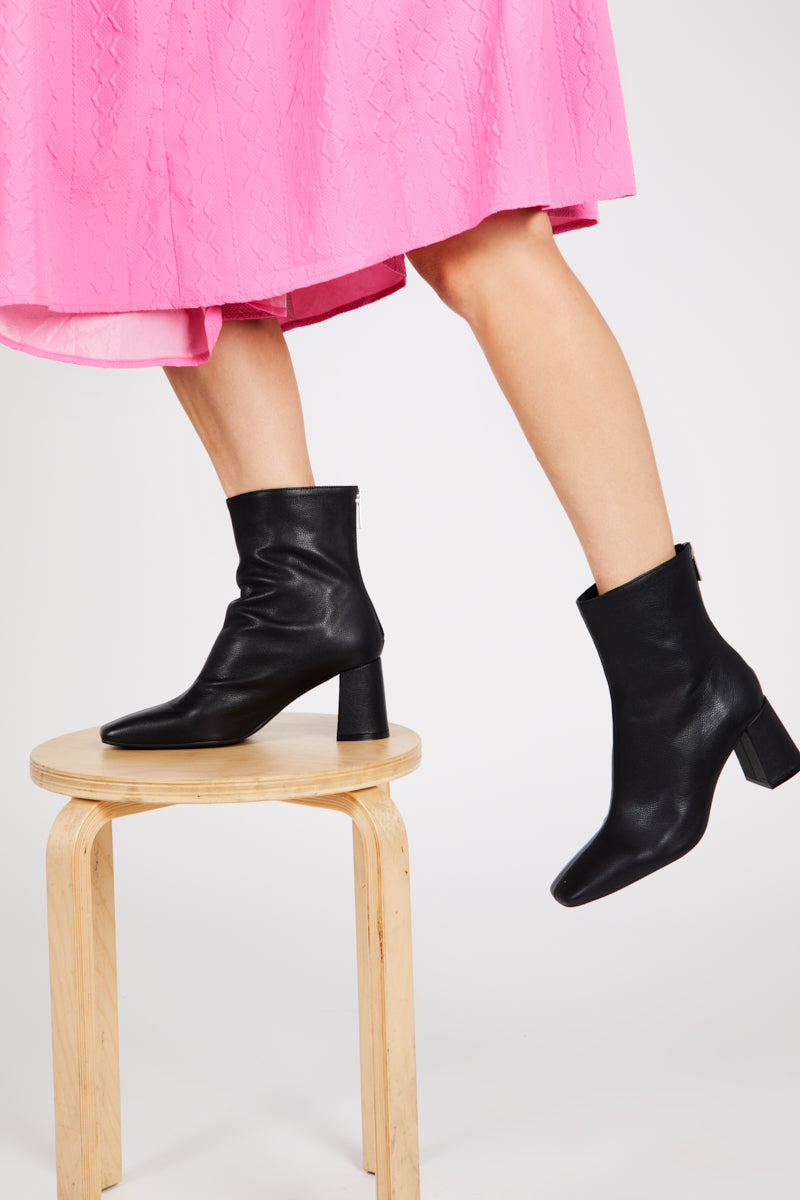 "INTENTIONALLY __________." TABATHA HEELED BOOT - Multi