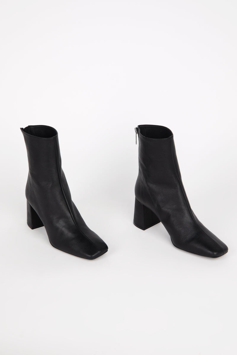 "INTENTIONALLY __________." TABATHA HEELED BOOT - Multi
