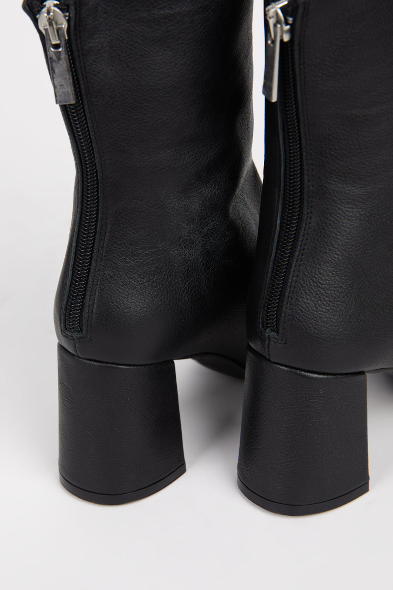 "INTENTIONALLY __________." TABATHA HEELED BOOT - Multi