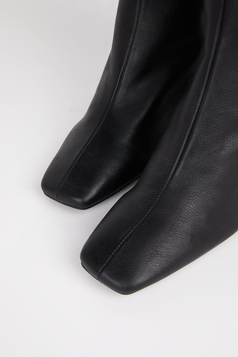 "INTENTIONALLY __________." TABATHA HEELED BOOT - Multi