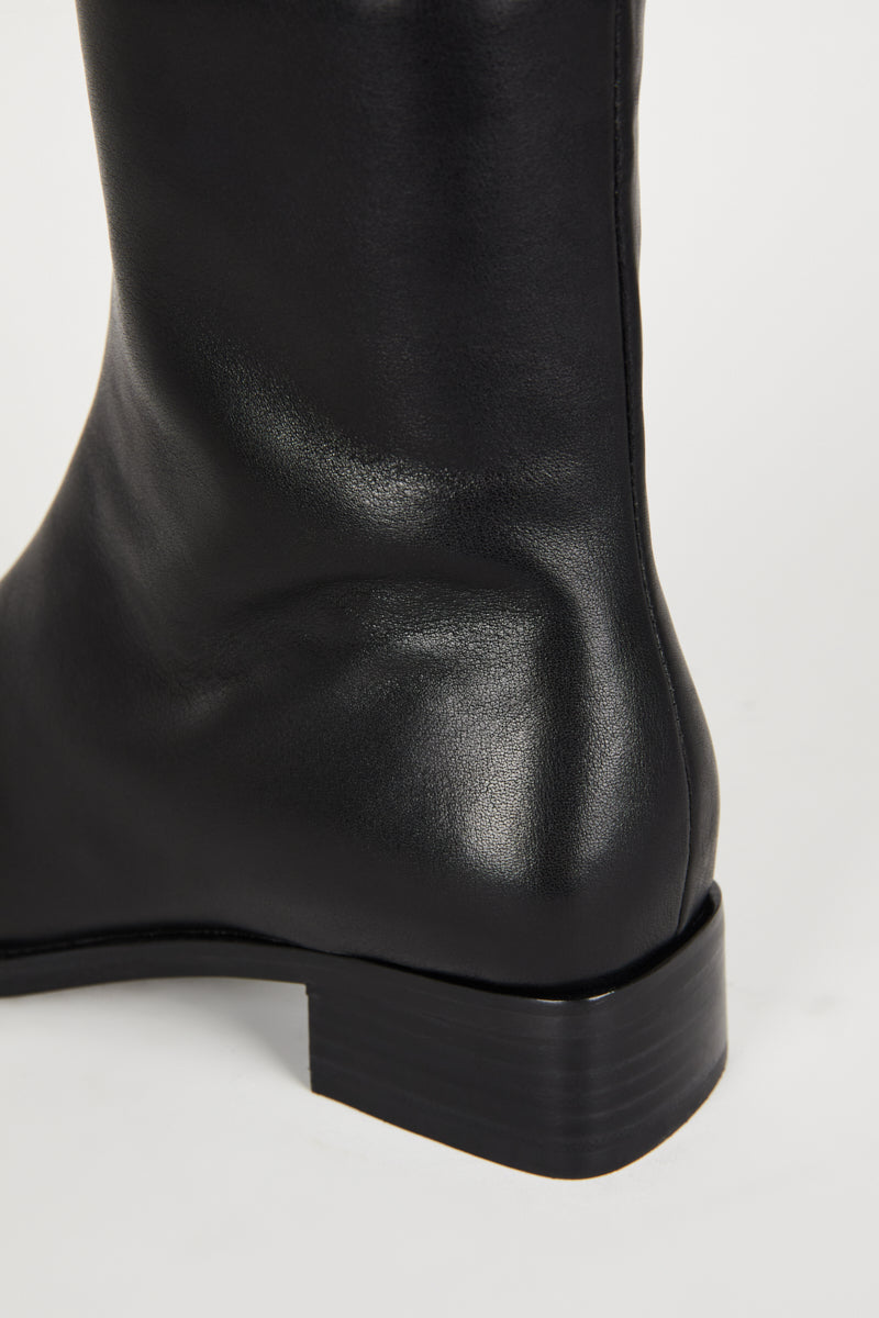 "INTENTIONALLY __________." TOUR LEATHER BOOT - Black/Brown