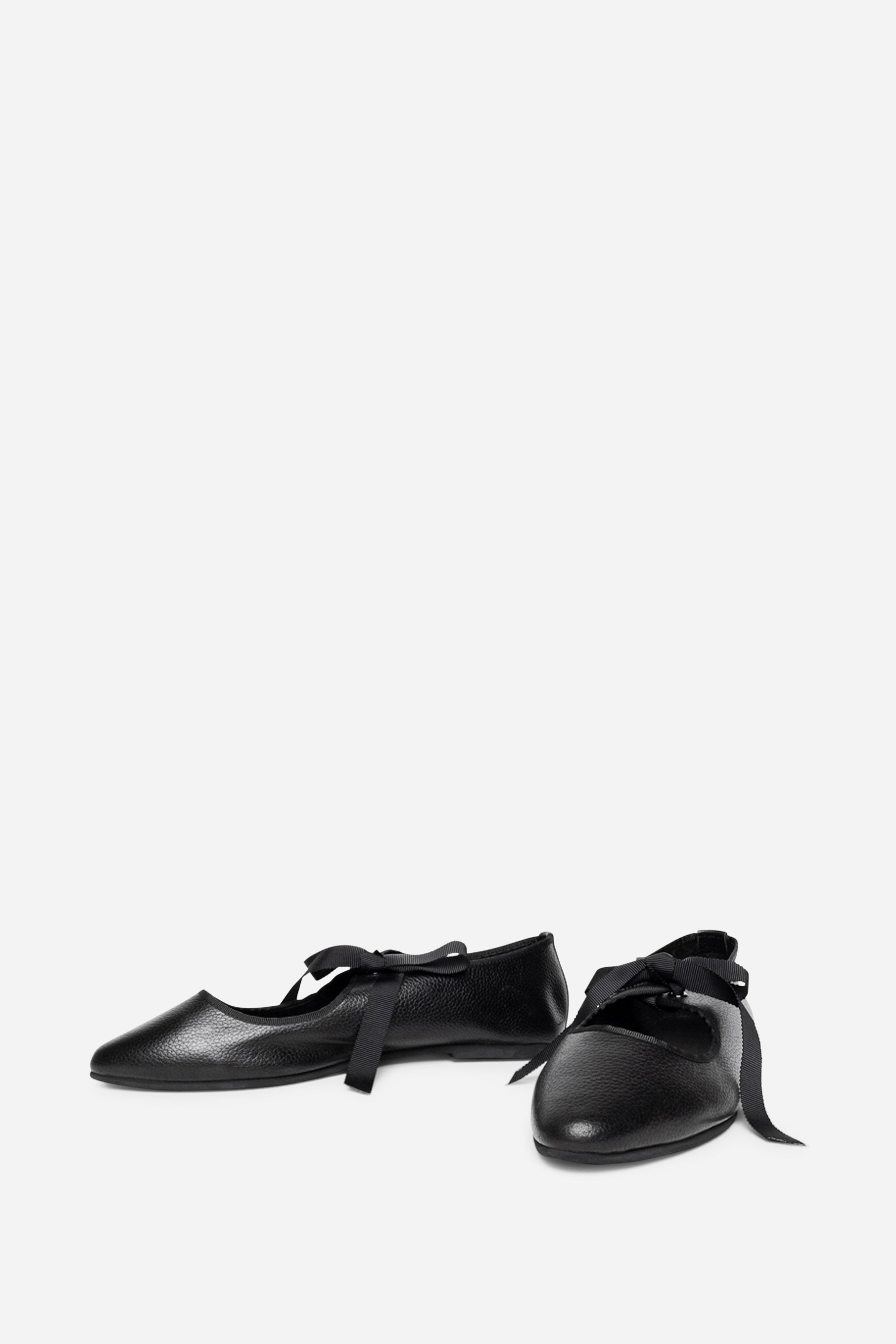 "INTENTIONALLY __________." Valley Sole Ballet Flat - Black
