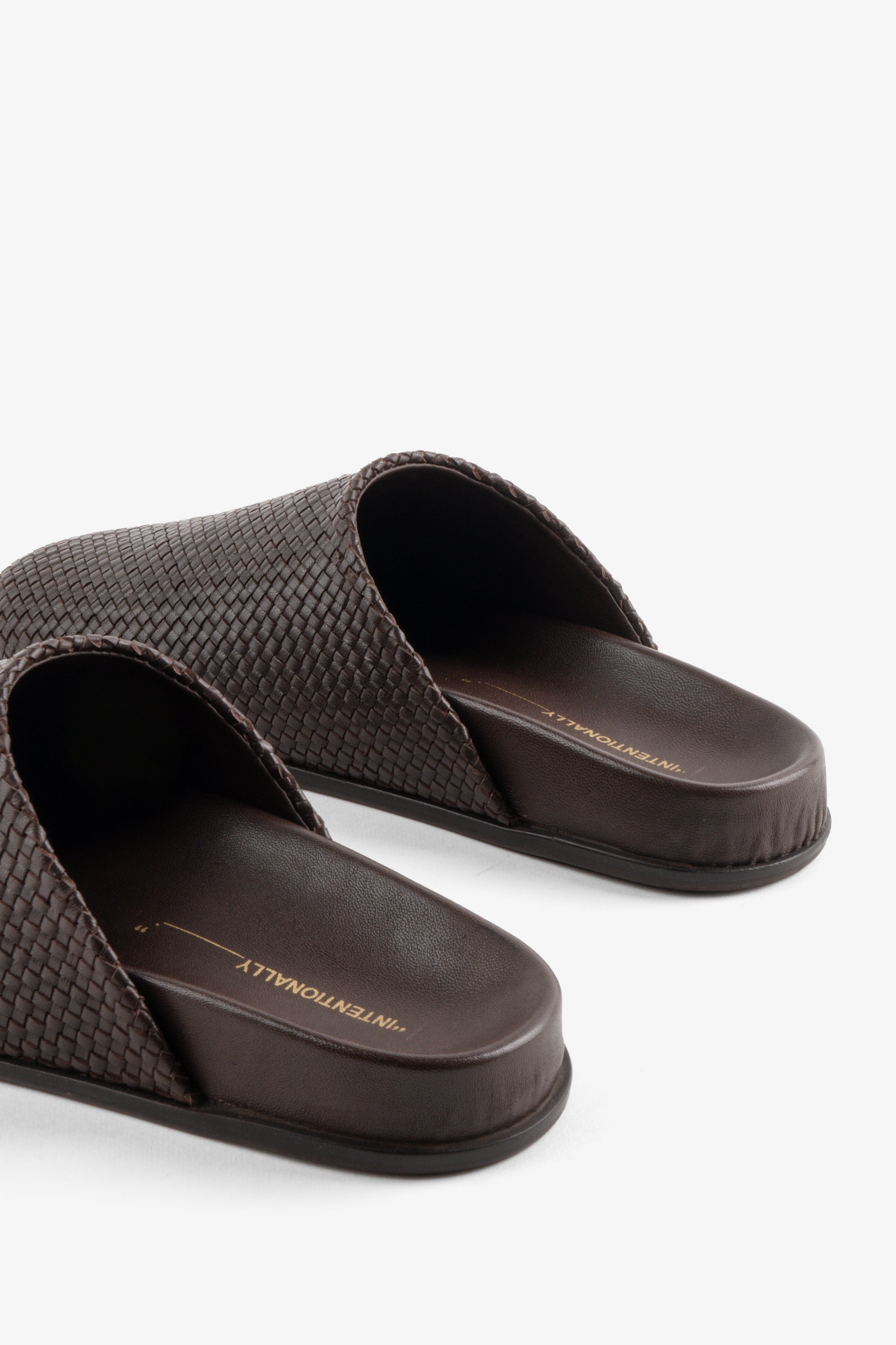 INTENTIONALLY __________. AGATHA WOVEN SLIP ON MULE
