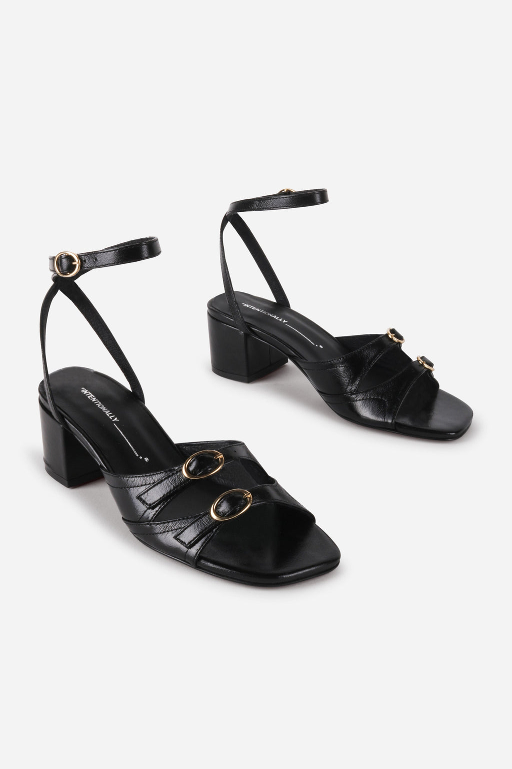 INTENTIONALLY __________. Lingo Block Heel Sandal