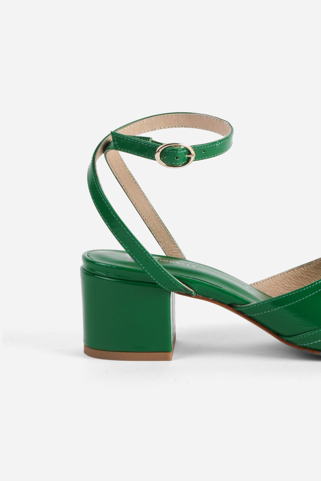INTENTIONALLY __________. Lingo Block Heel Sandal
