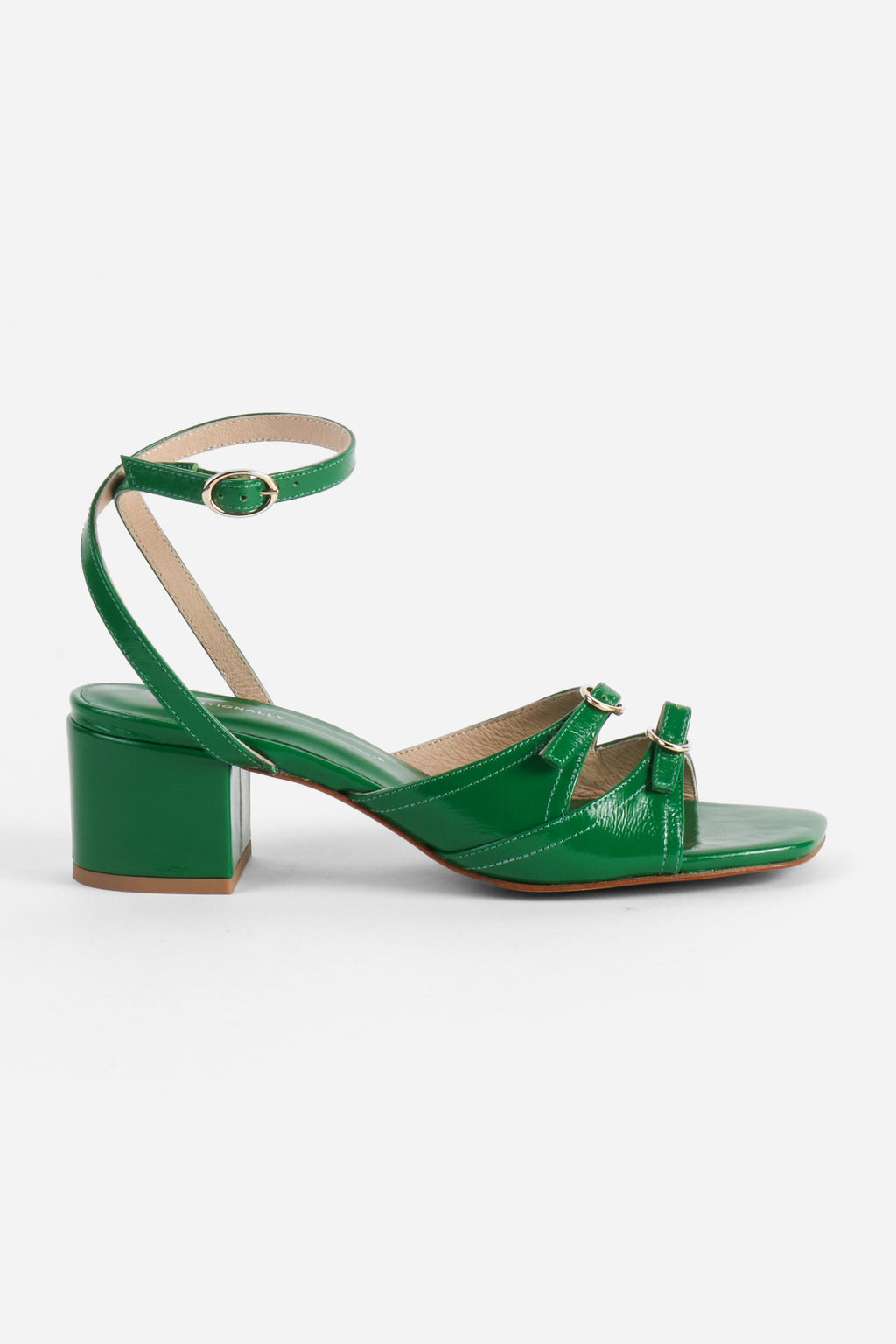 INTENTIONALLY __________. Lingo Block Heel Sandal