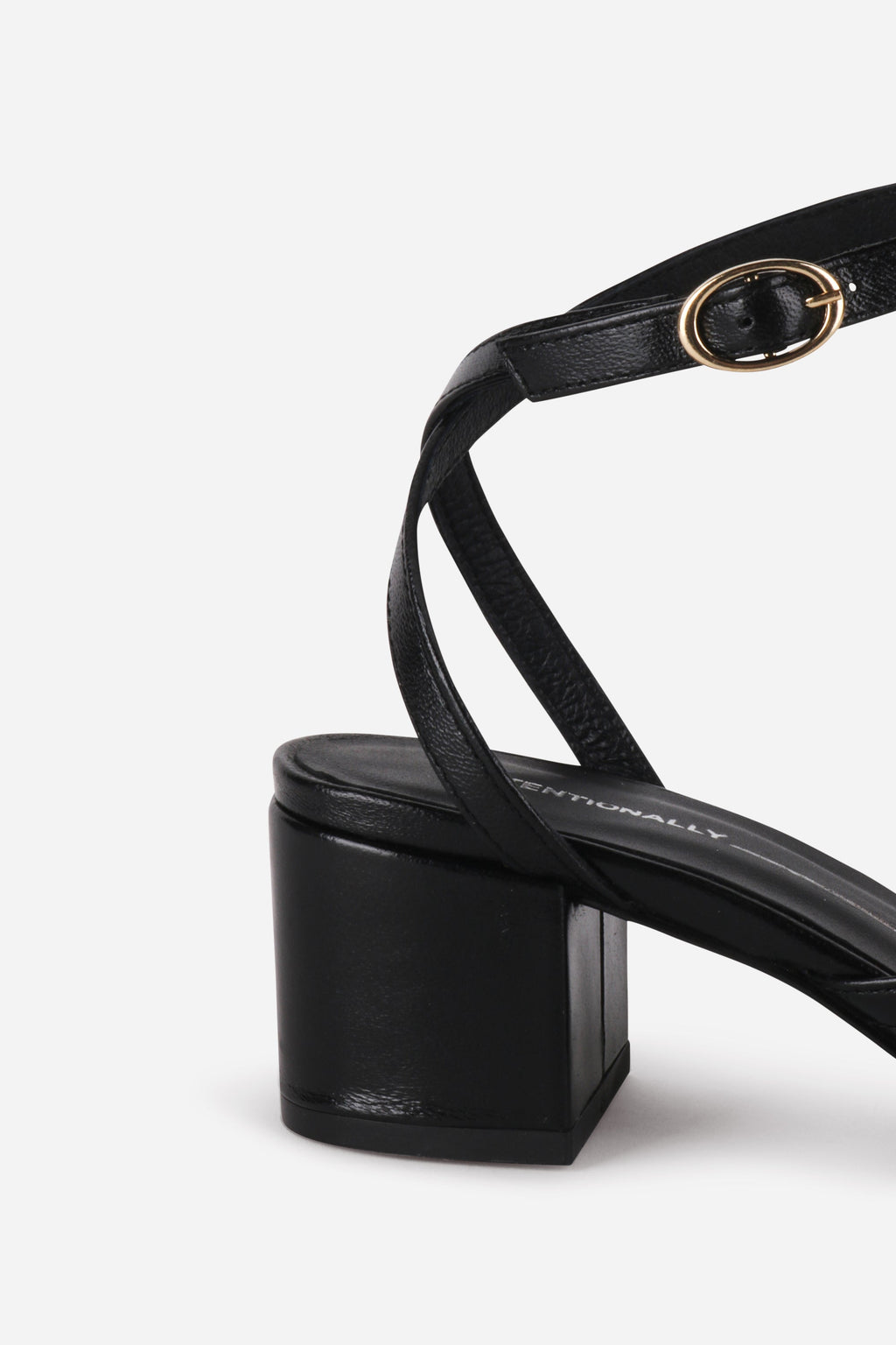 INTENTIONALLY __________. Lingo Block Heel Sandal