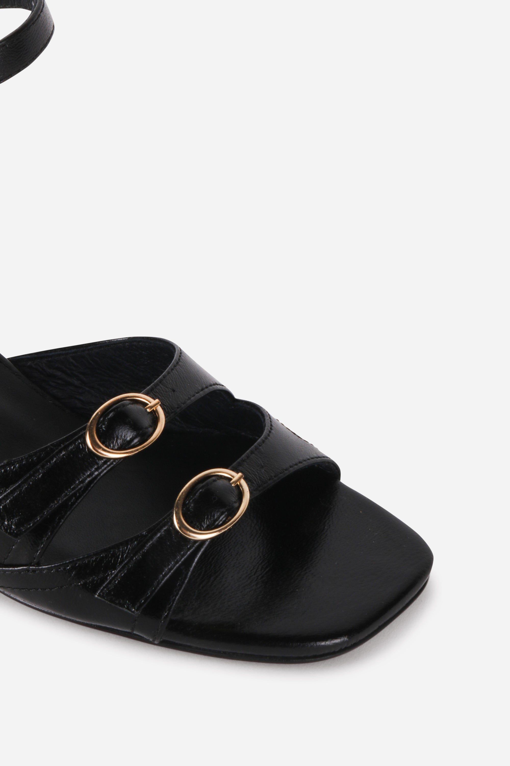 INTENTIONALLY __________. Lingo Block Heel Sandal