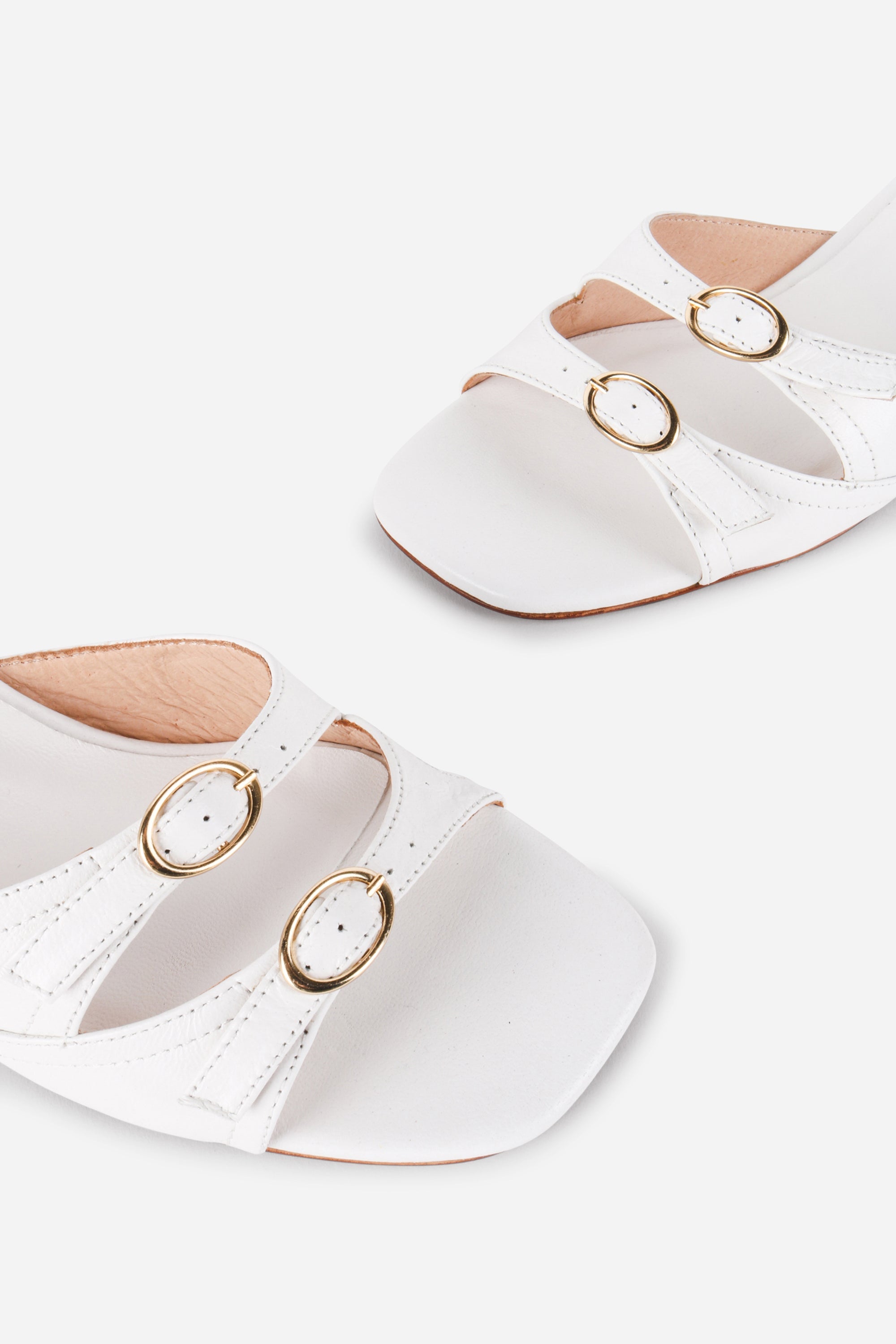 INTENTIONALLY __________. Lingo Block Heel Sandal