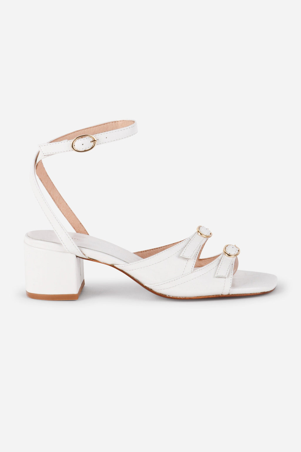 INTENTIONALLY __________. Lingo Block Heel Sandal