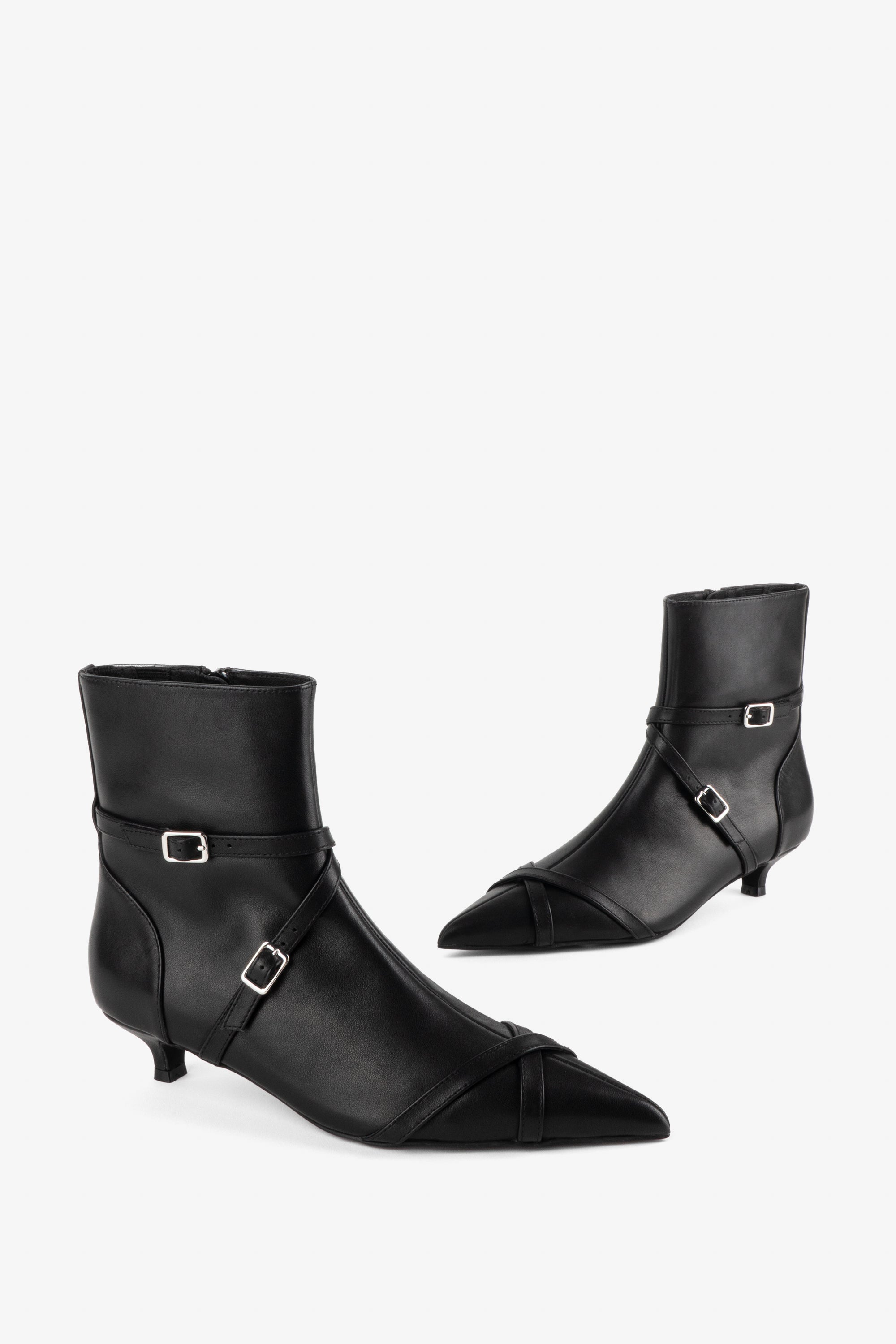 INTENTIONALLY __________. Link Kitten Heel Buckled Ankle Boot - Black