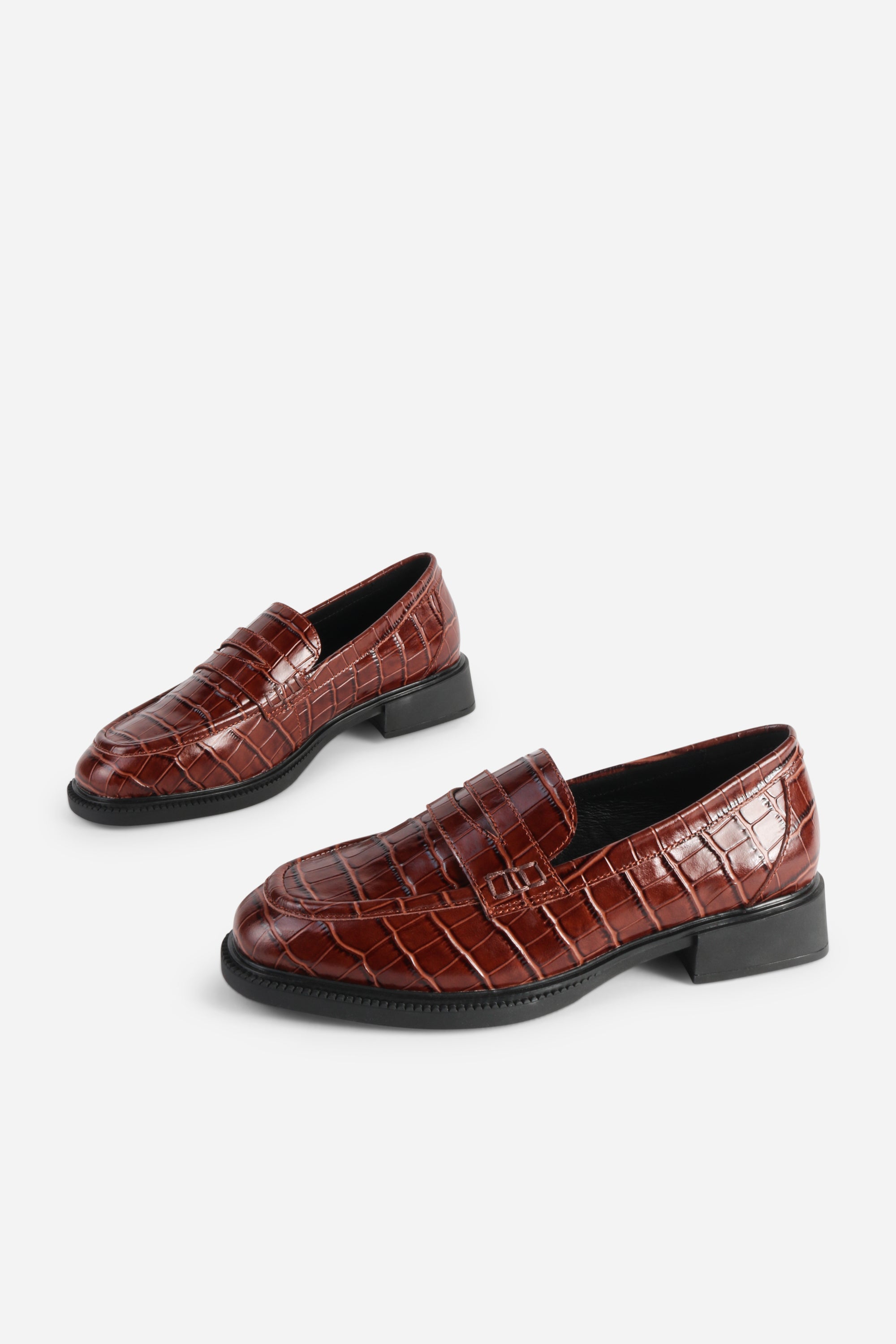 INTENTIONALLY __________. Marblehead Penny Loafer