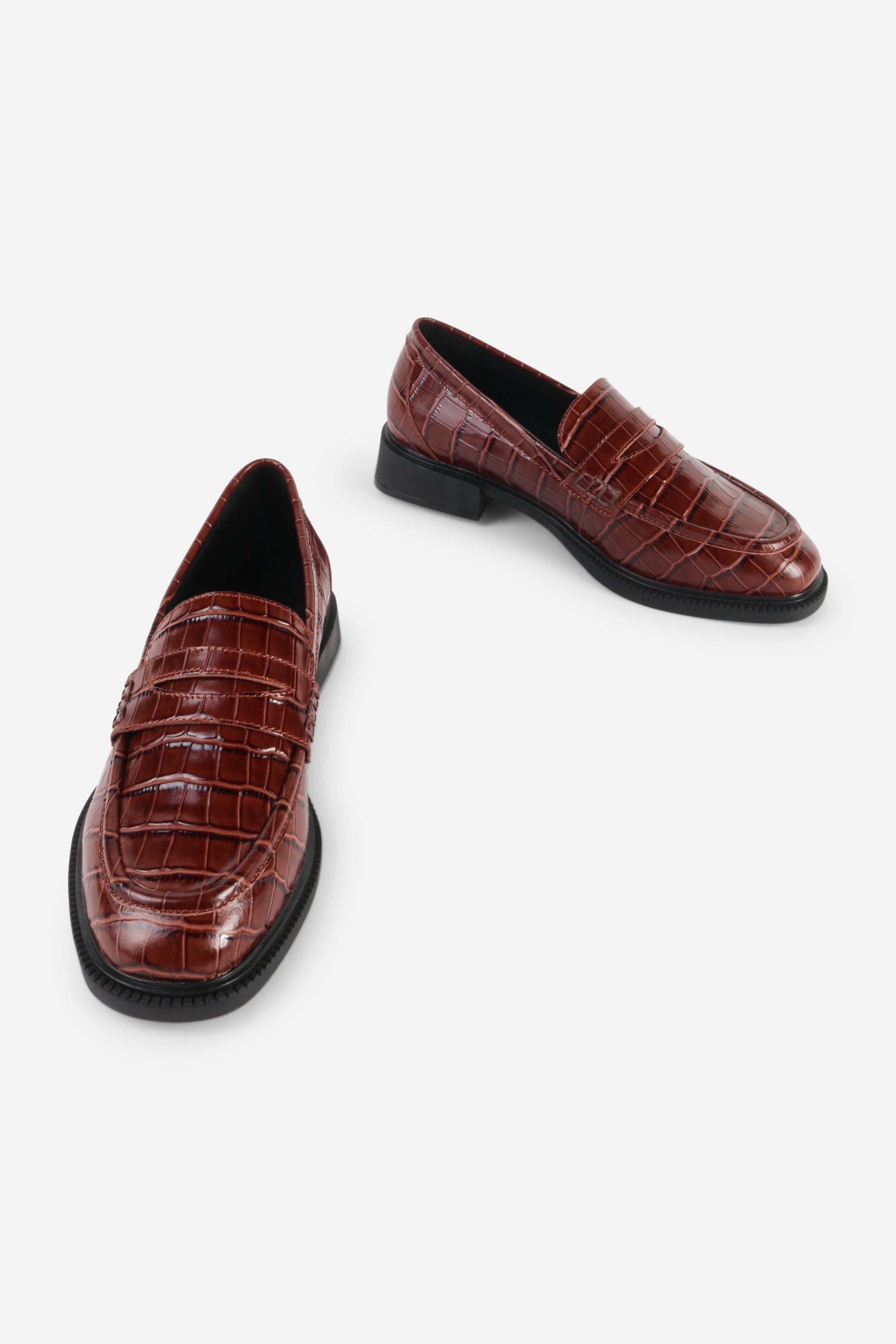 INTENTIONALLY __________. Marblehead Penny Loafer