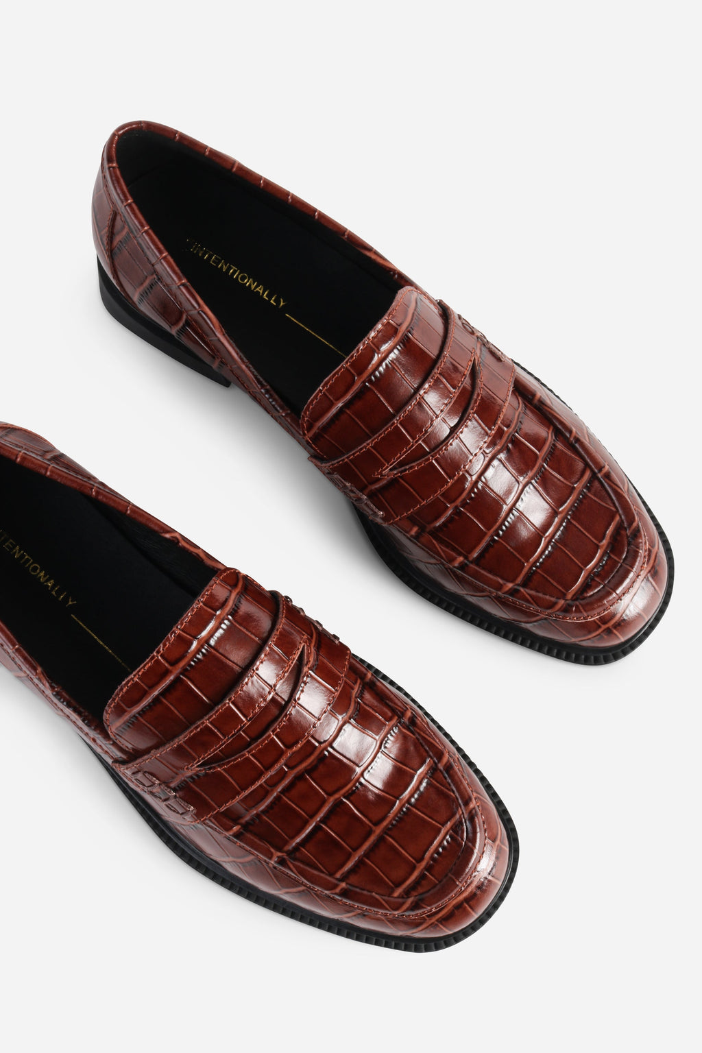 INTENTIONALLY __________. Marblehead Penny Loafer
