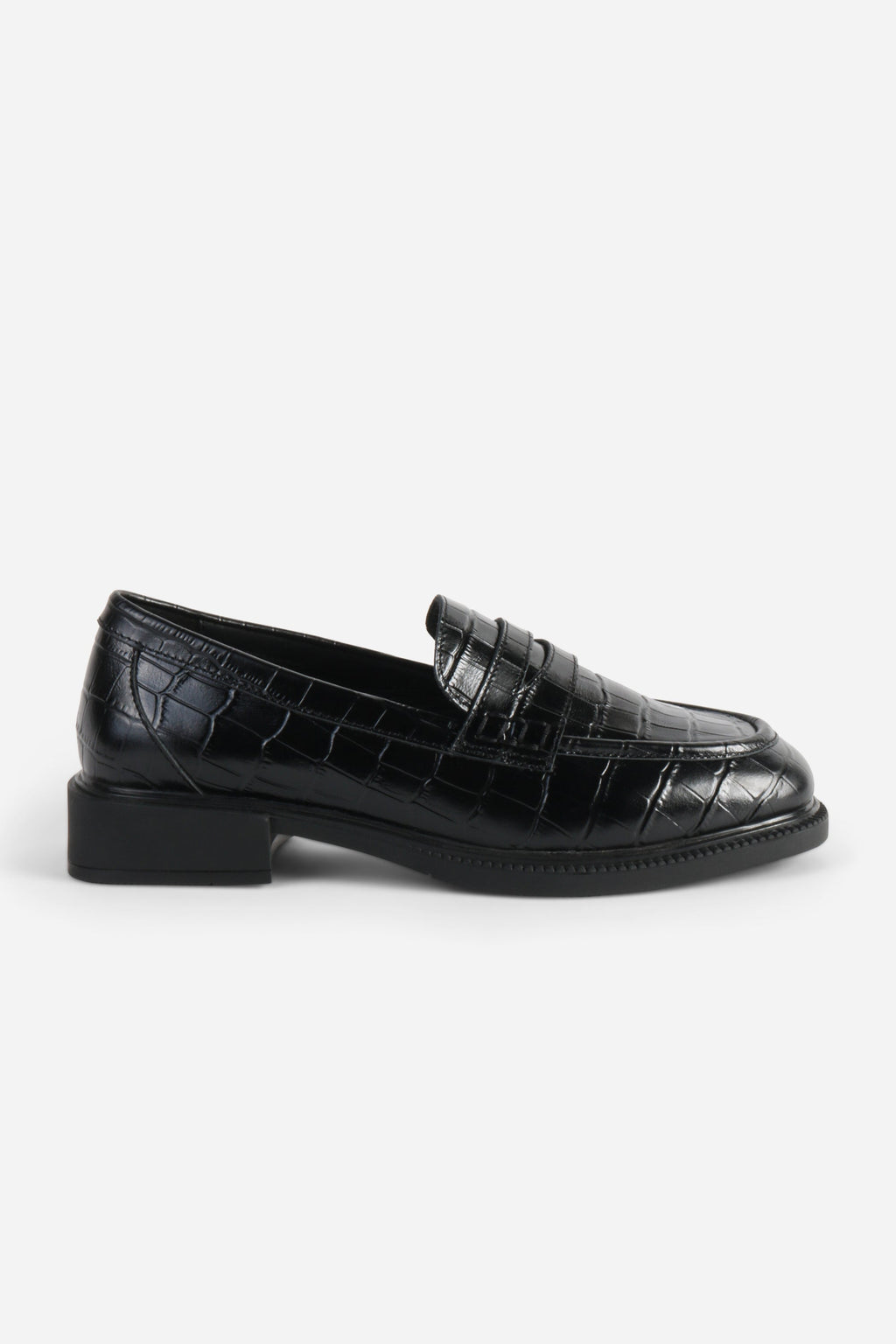 INTENTIONALLY __________. Marblehead Penny Loafer