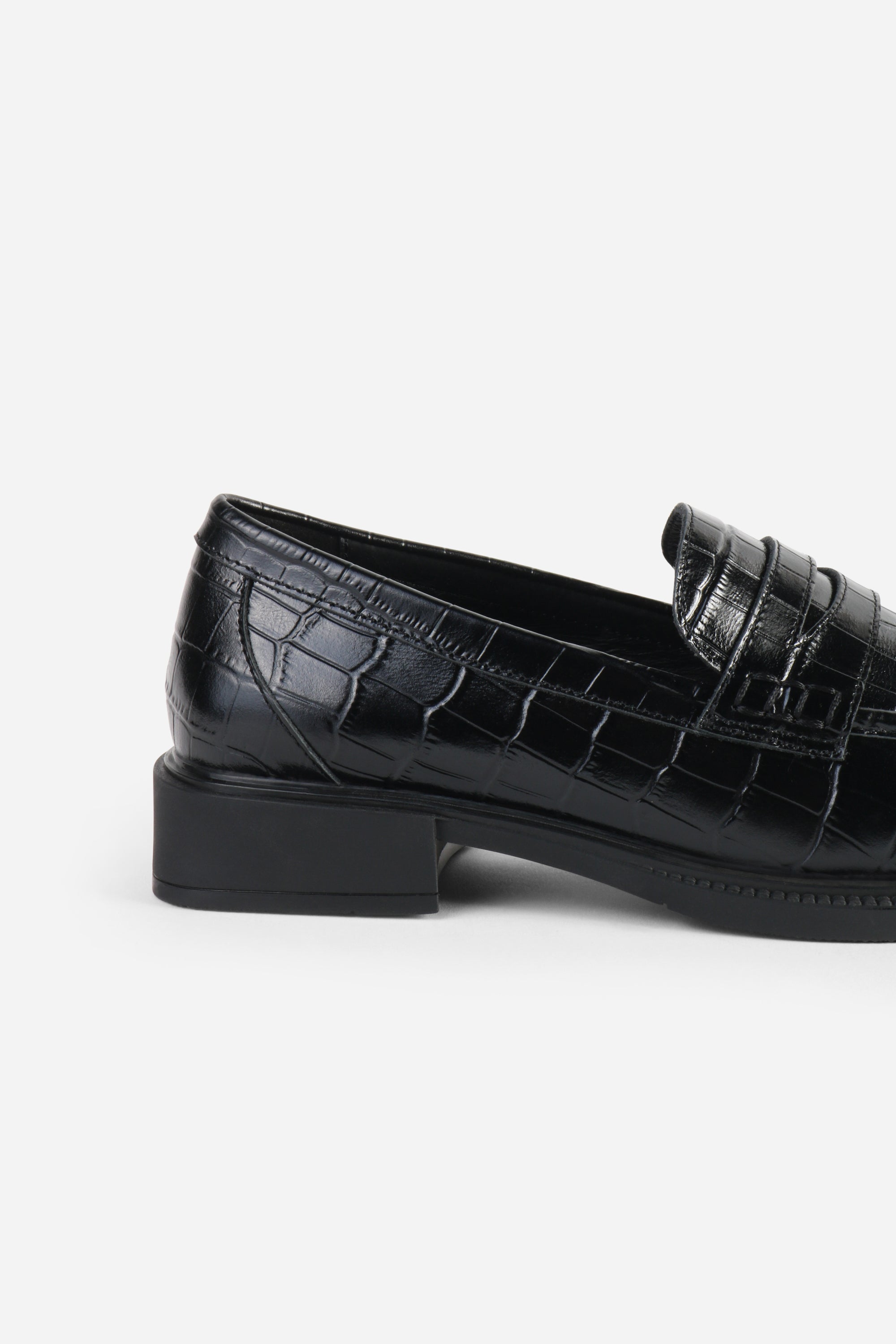 INTENTIONALLY __________. Marblehead Penny Loafer