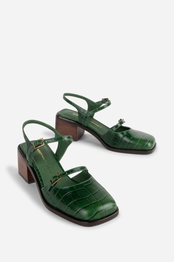 INTENTIONALLY __________. Mitzi Block Heel