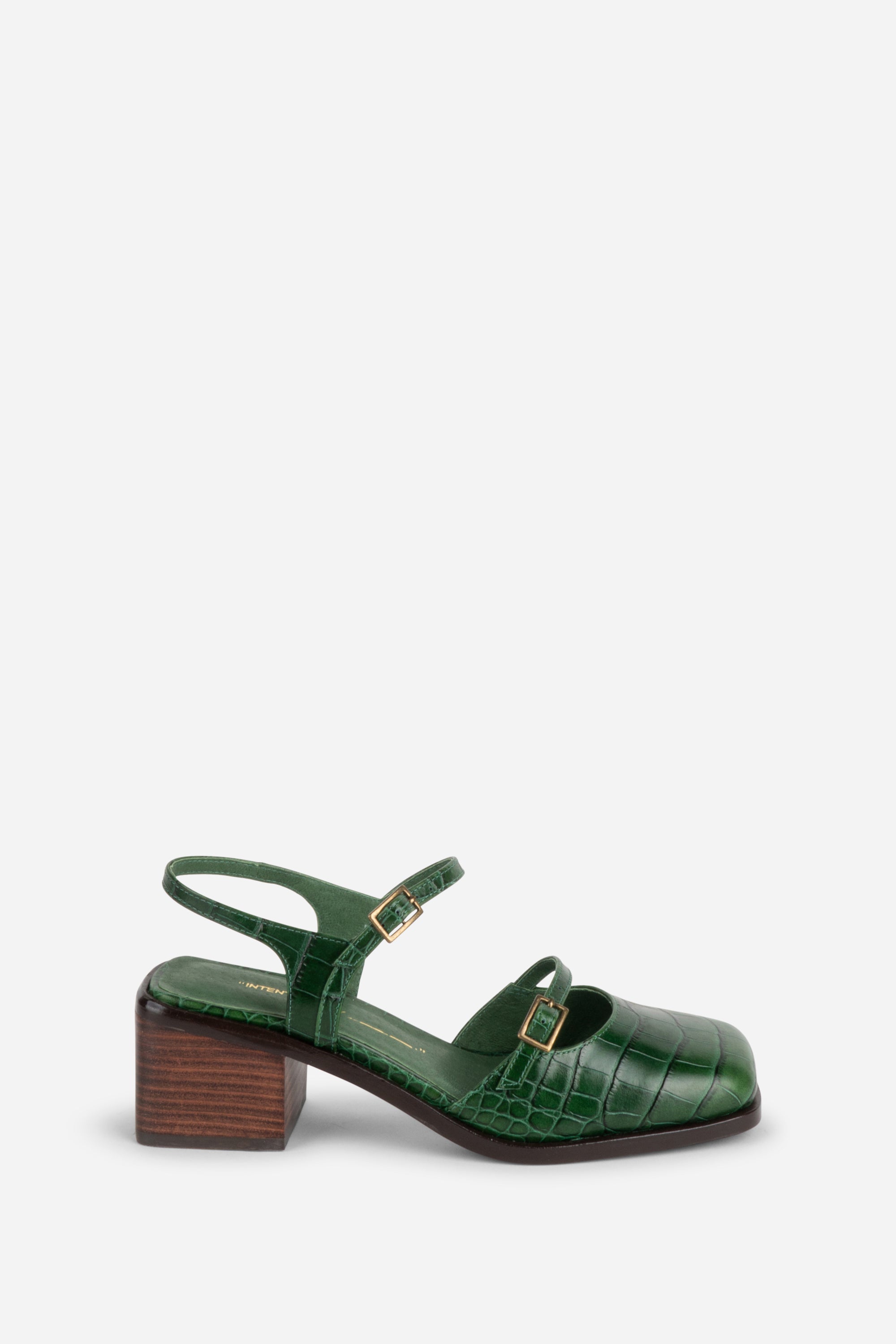 INTENTIONALLY __________. Mitzi Block Heel