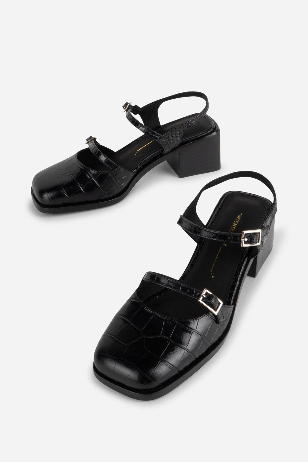 INTENTIONALLY __________. Mitzi Block Heel