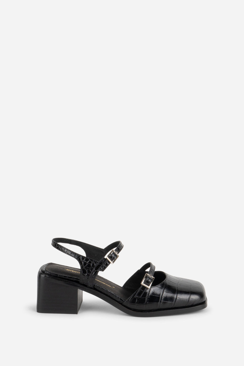 INTENTIONALLY __________. Mitzi Block Heel