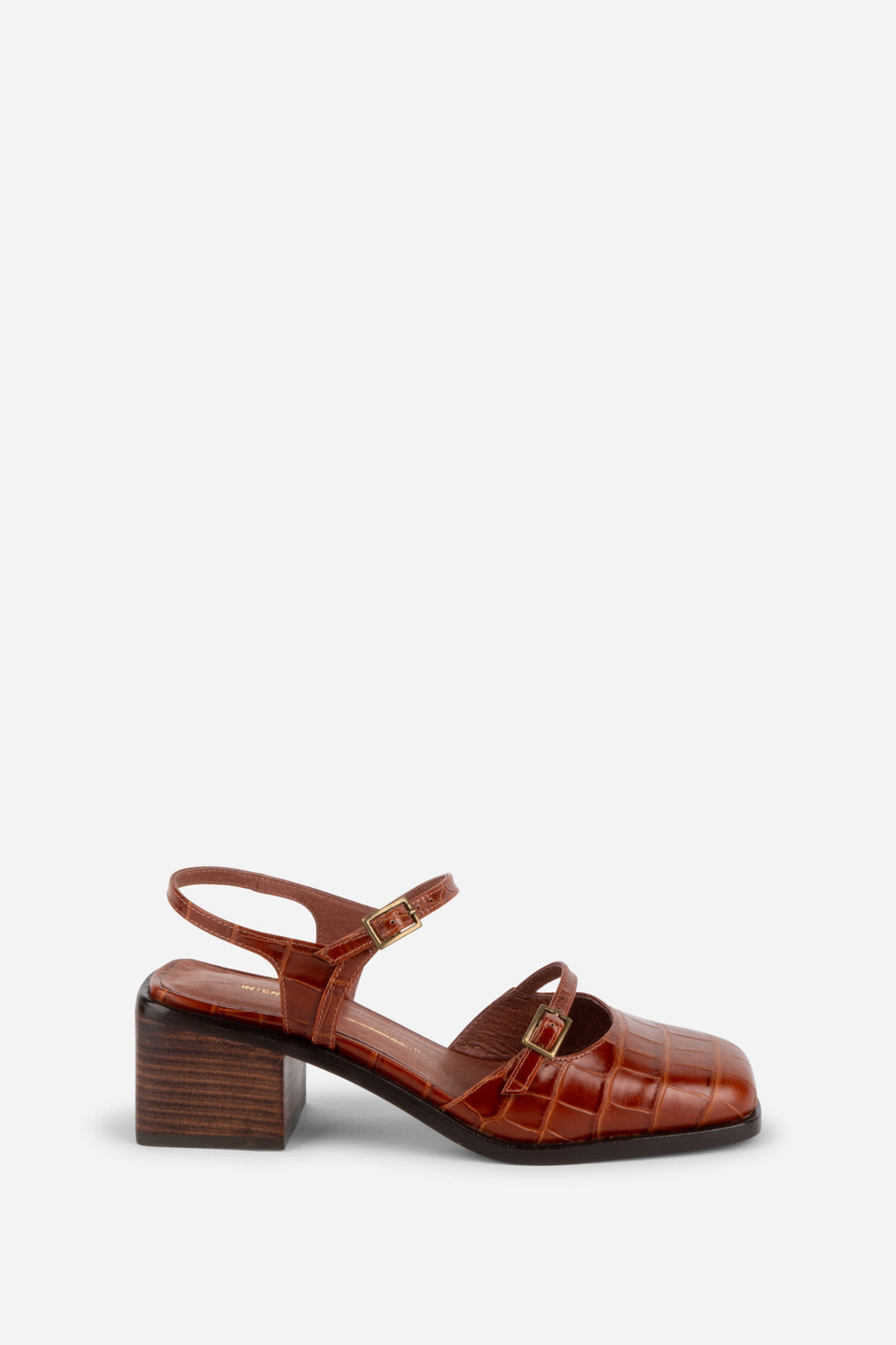 INTENTIONALLY __________. Mitzi Block Heel