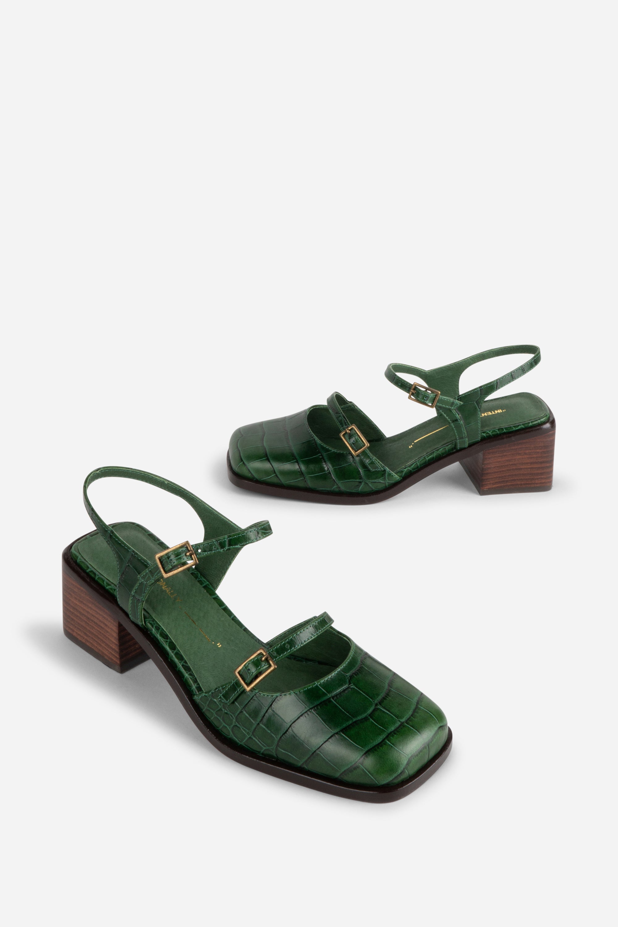 INTENTIONALLY __________. Mitzi Block Heel