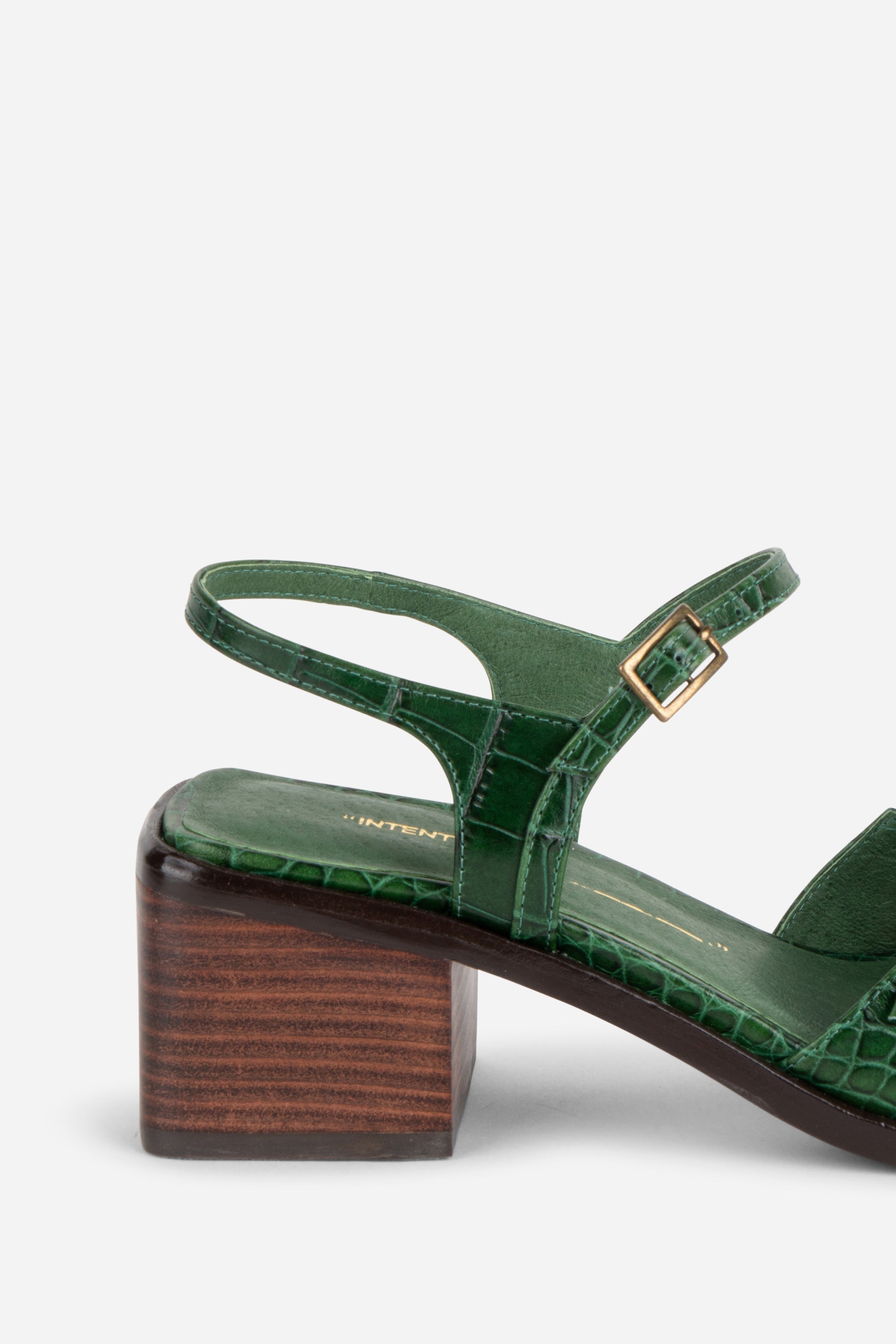 INTENTIONALLY __________. Mitzi Block Heel