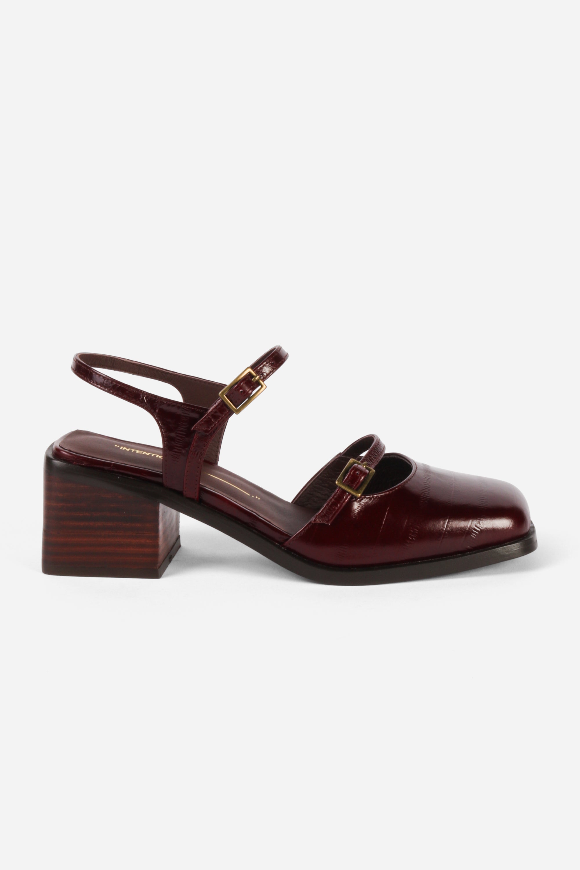 INTENTIONALLY __________. Mitzi Block Heel