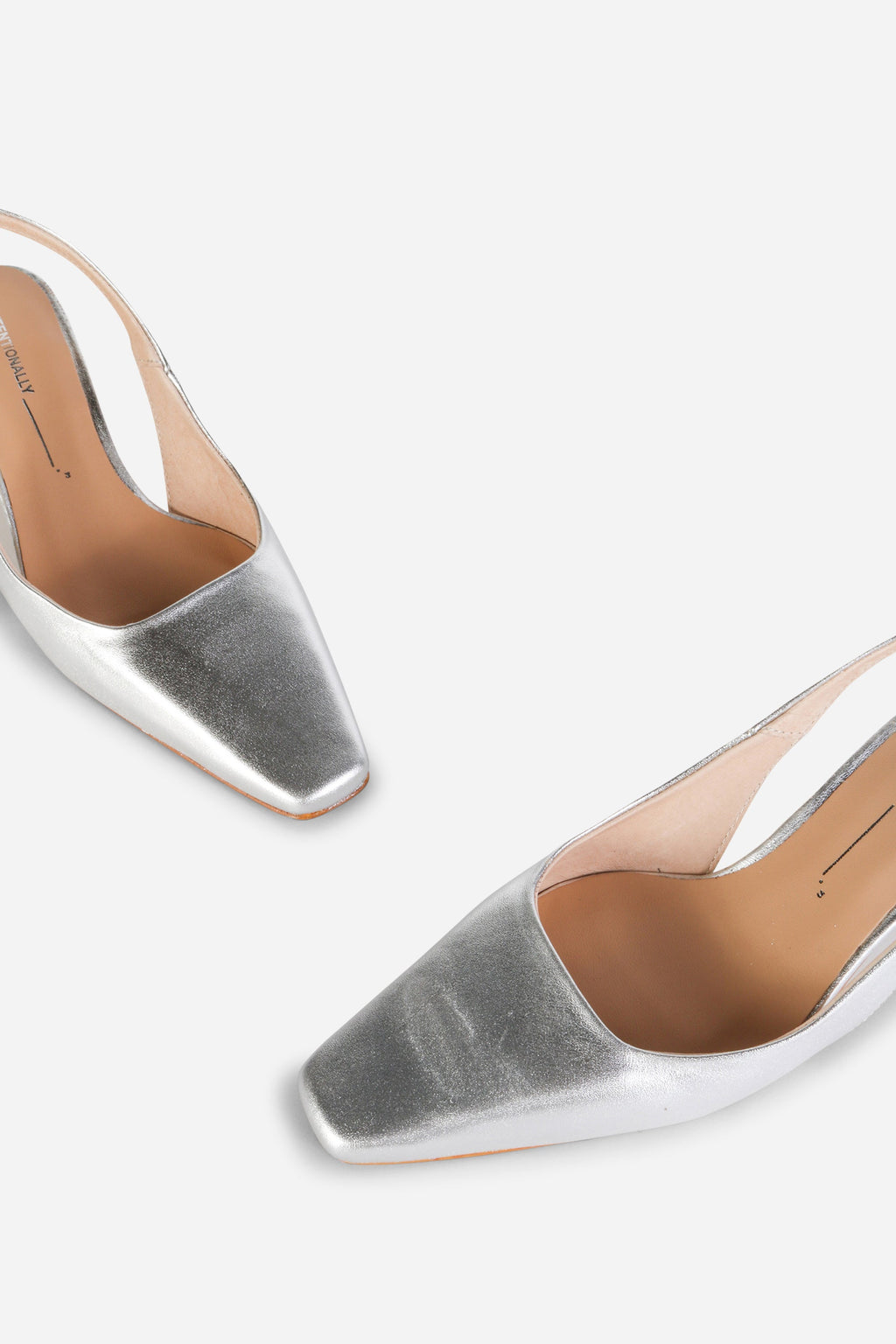 INTENTIONALLY __________. Parker Slingback Heel