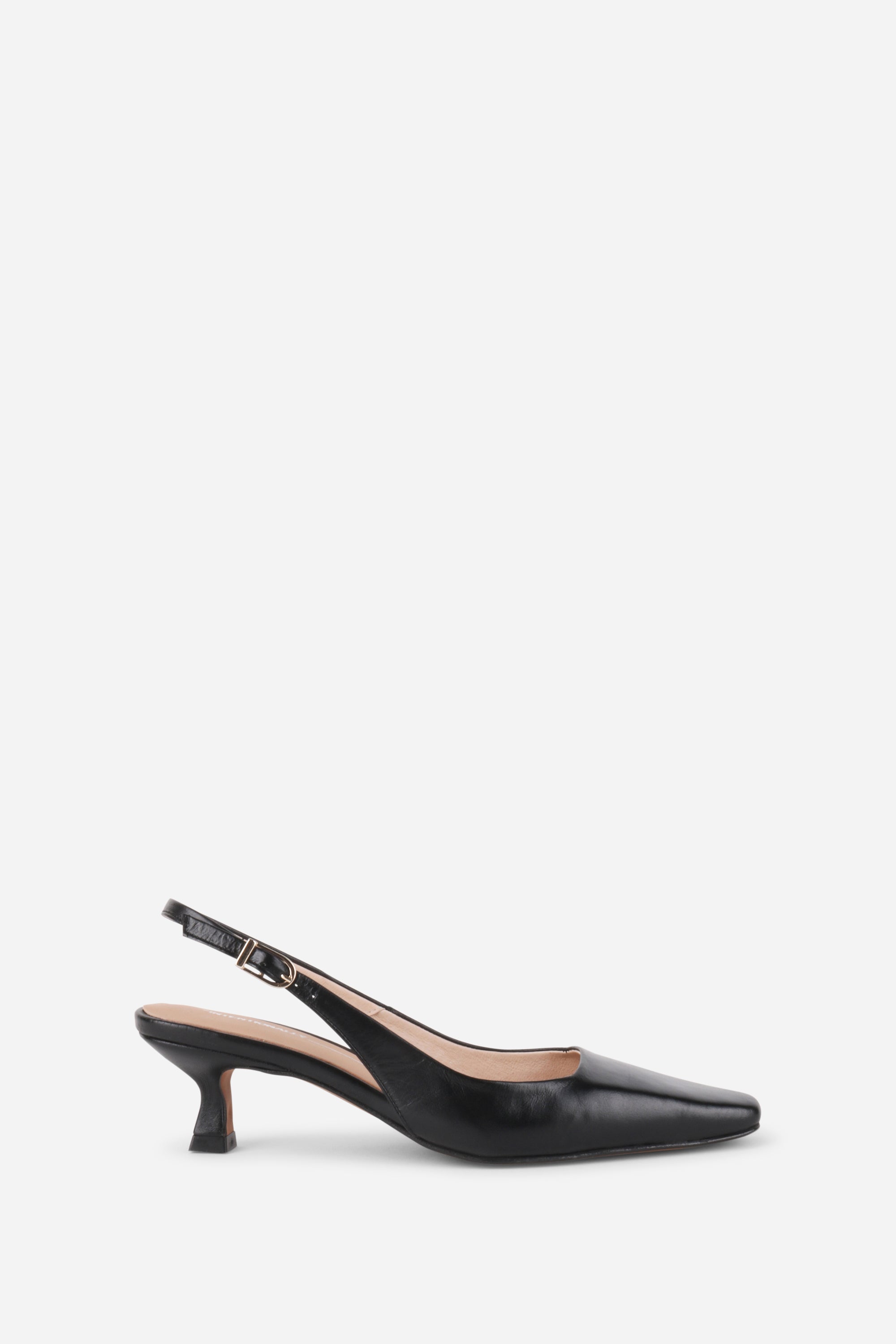 INTENTIONALLY __________. Parker Slingback Heel