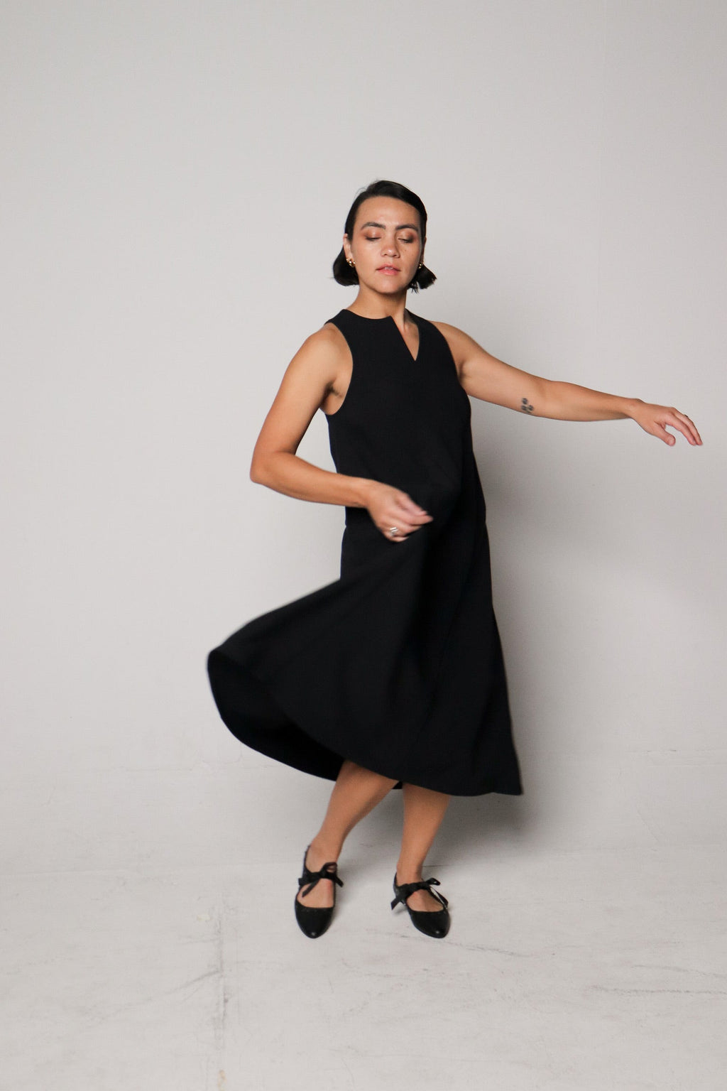 INTENTIONALLY __________. Peak Leather Ballet Flat